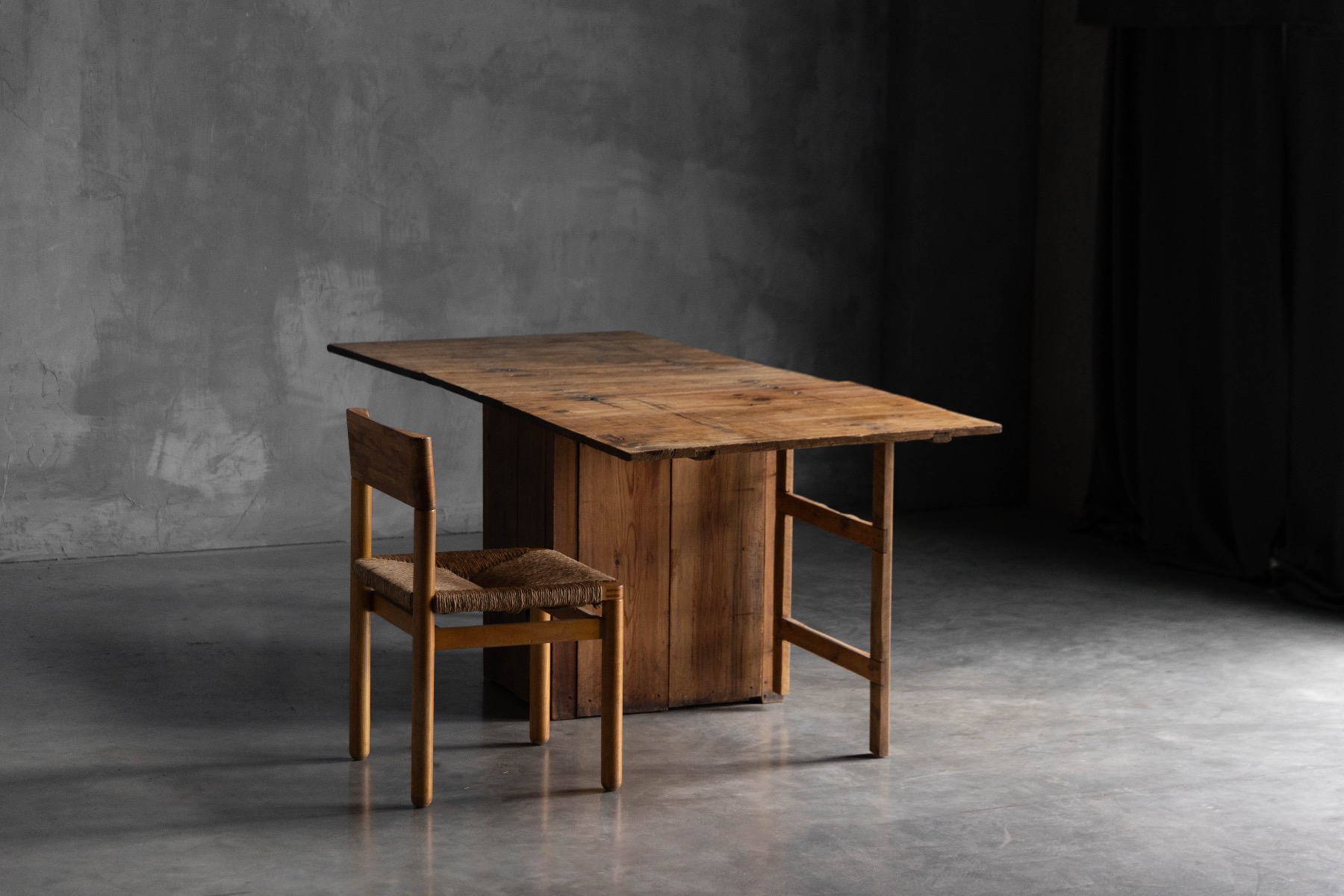 Antique worktable designed with practical drop leaf sides