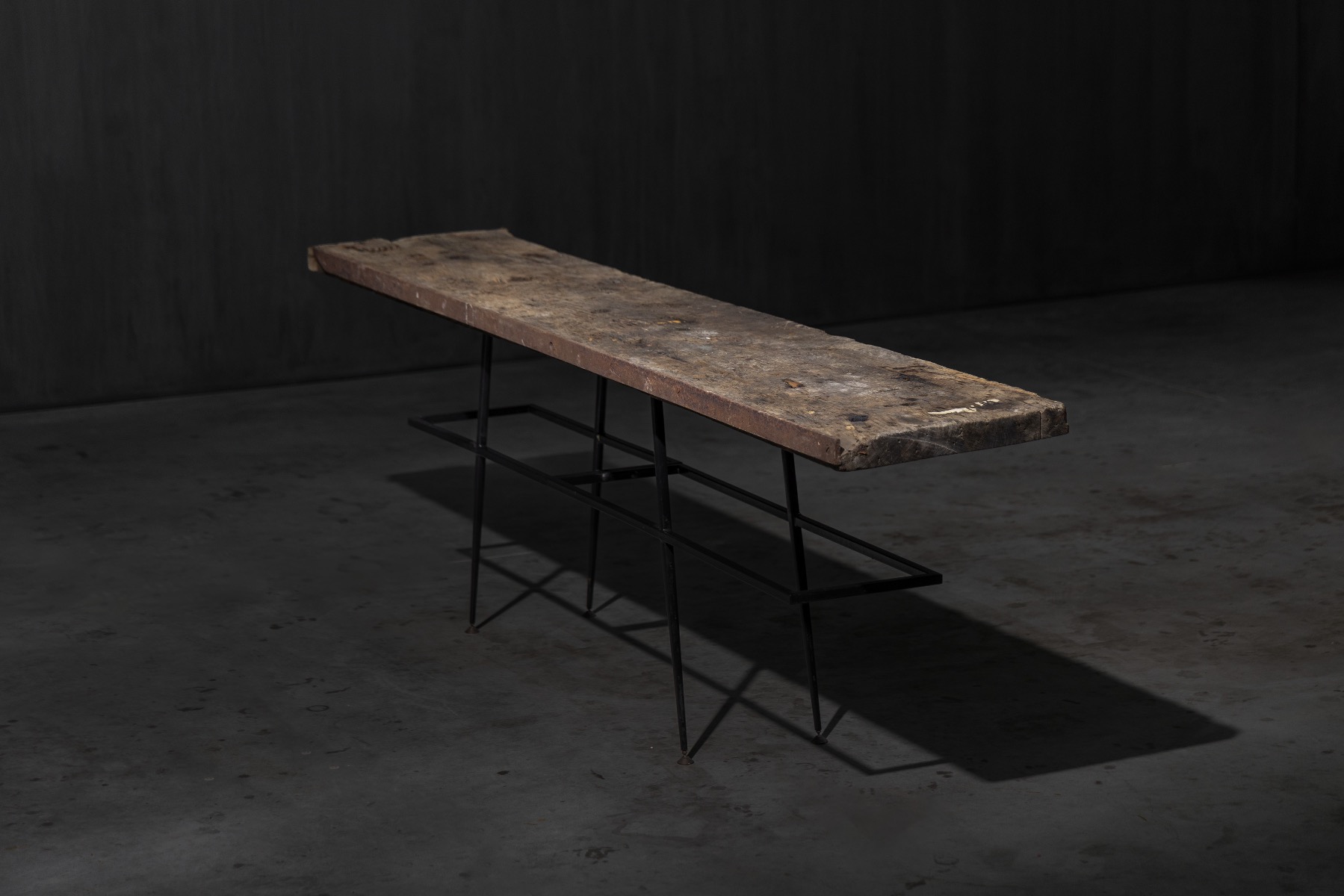 Minimalist console table with raw material finish