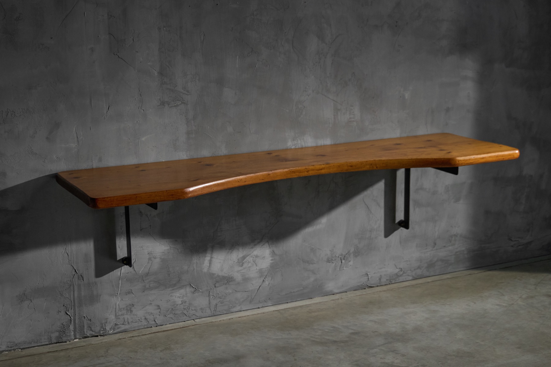 Architectural wall mounted desk in modernist style by Charlotte Perriand