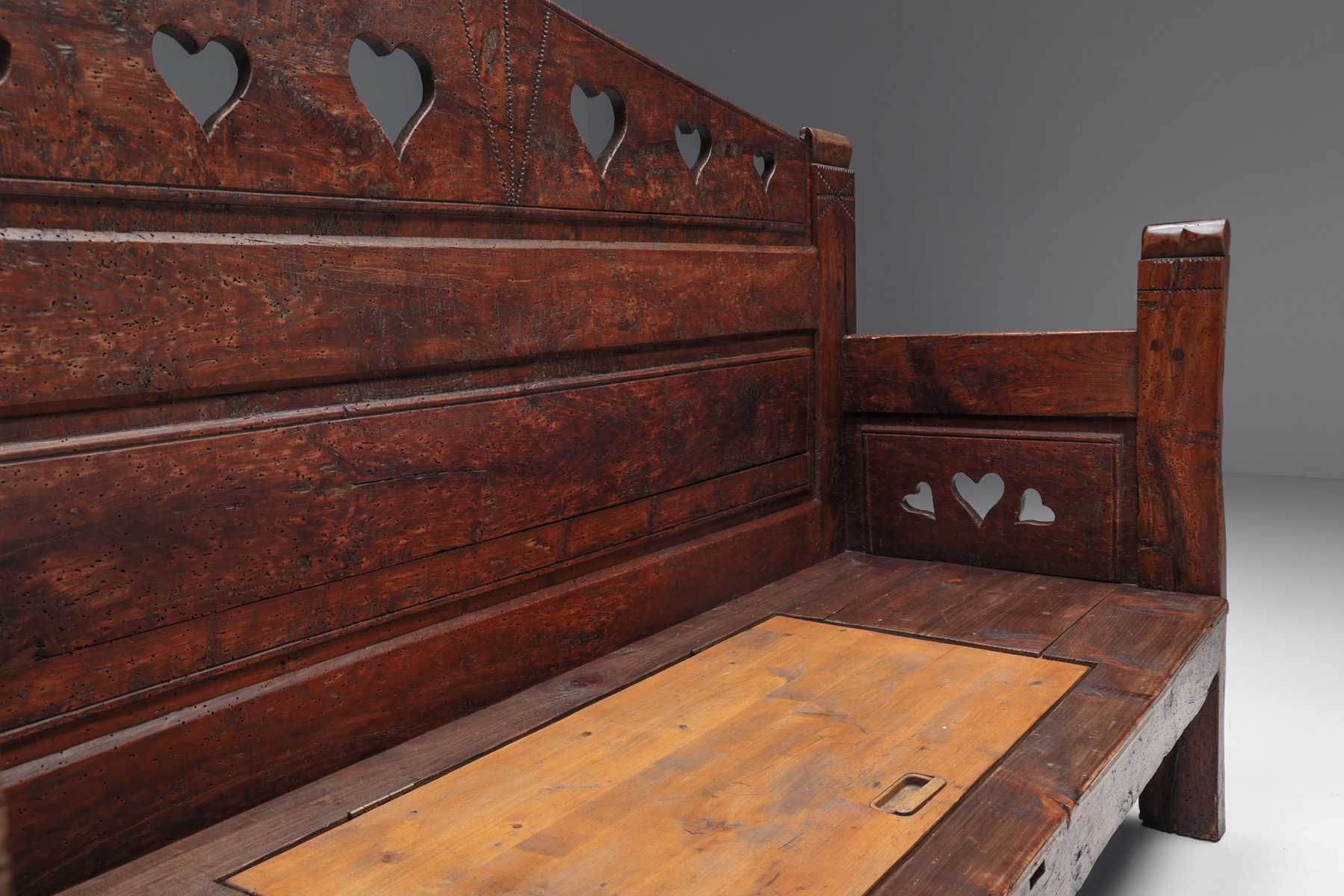 Authentic carved bench from the nineteenth century with storage