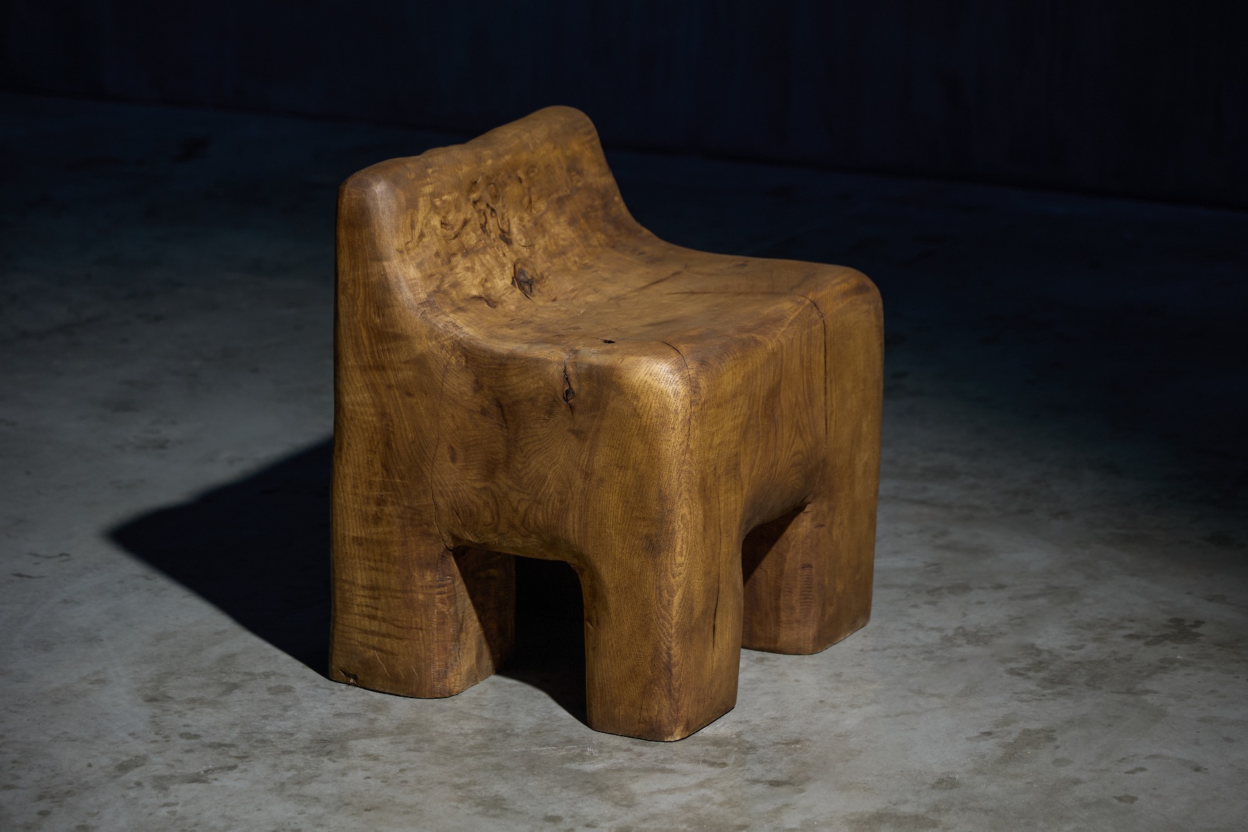 Organic sculptural wooden chair with brutalist influence