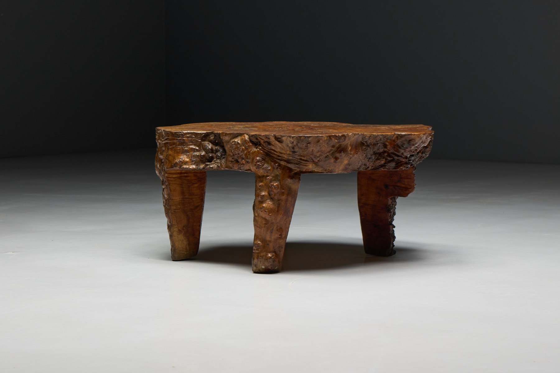 Sculptural burl wood coffee table from 1950s France with hand formed supports  
