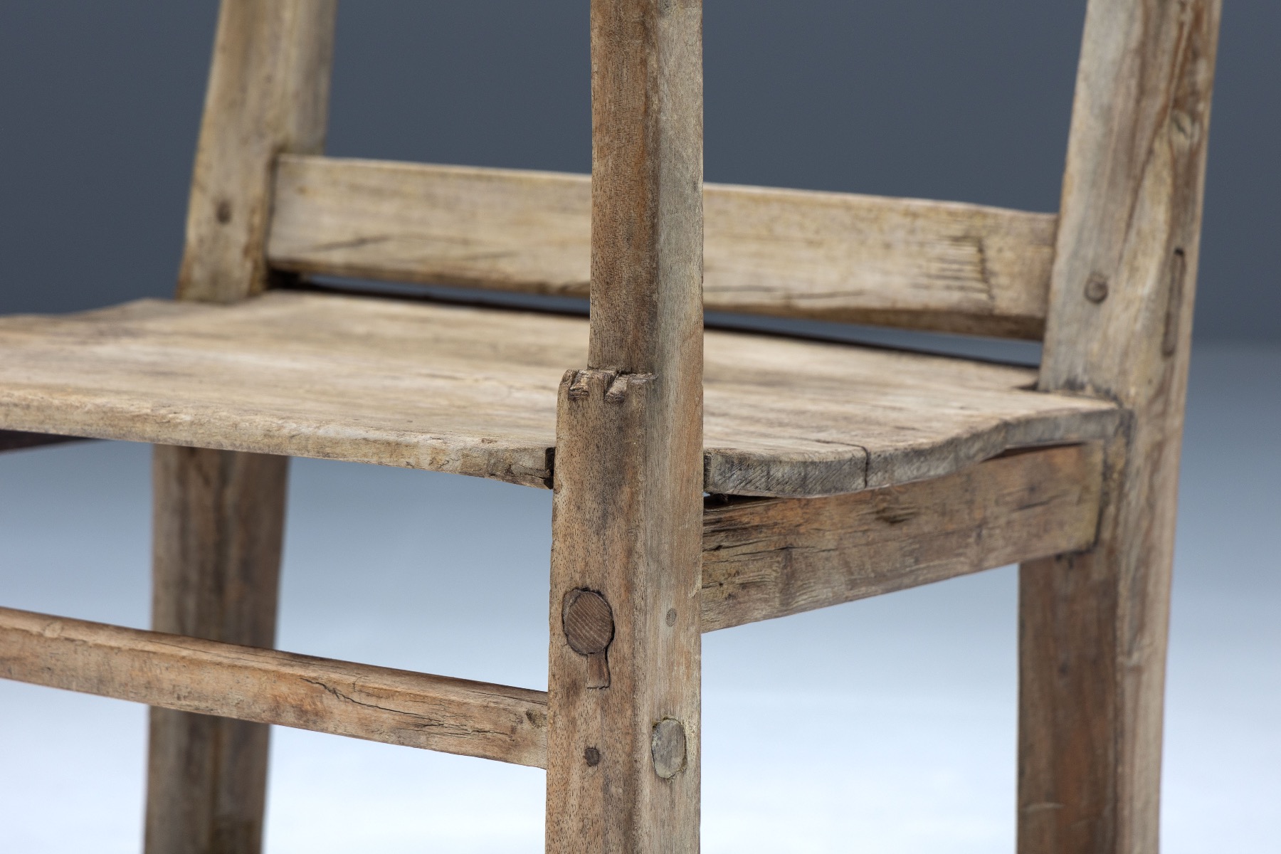 Early art populaire armchair handmade in wood