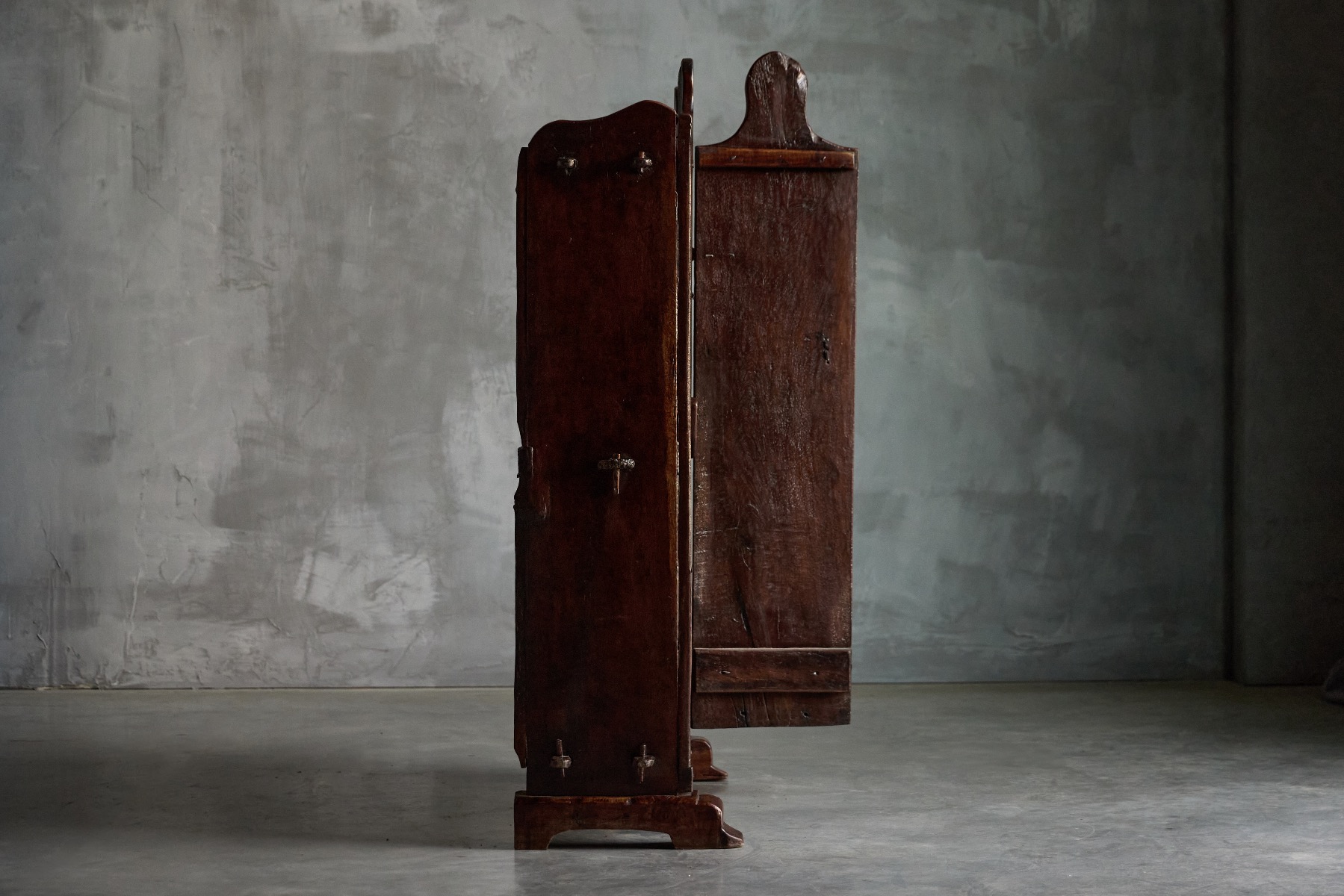 Antique wooden cabinet with rustic detailing