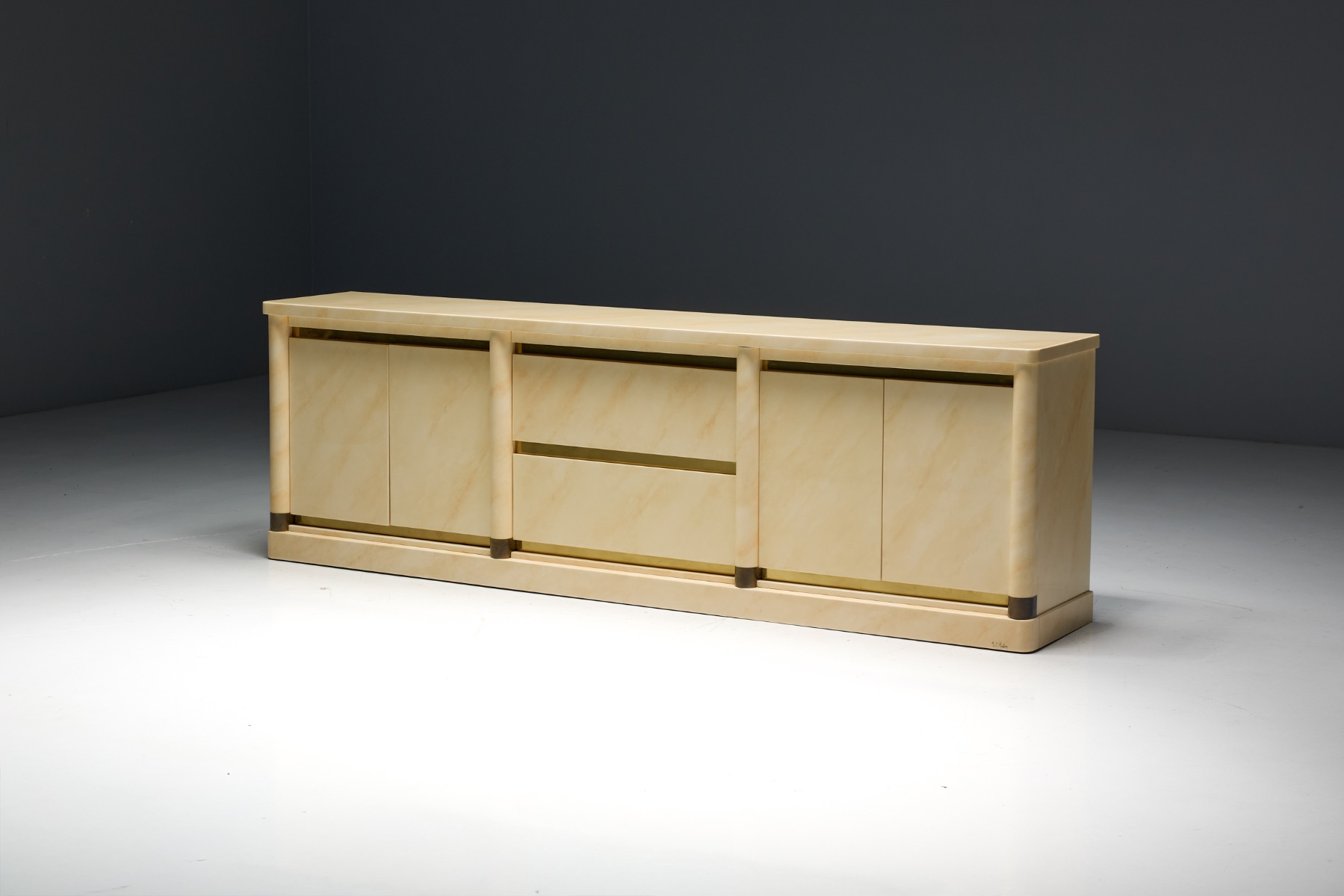 Faux marble sideboard by Jean Claude Mahey with sculptural presence