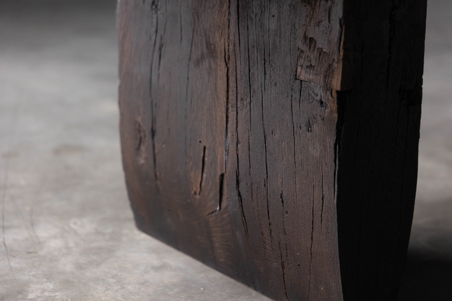 Folk art rustic coffee table with raw brutalist presence