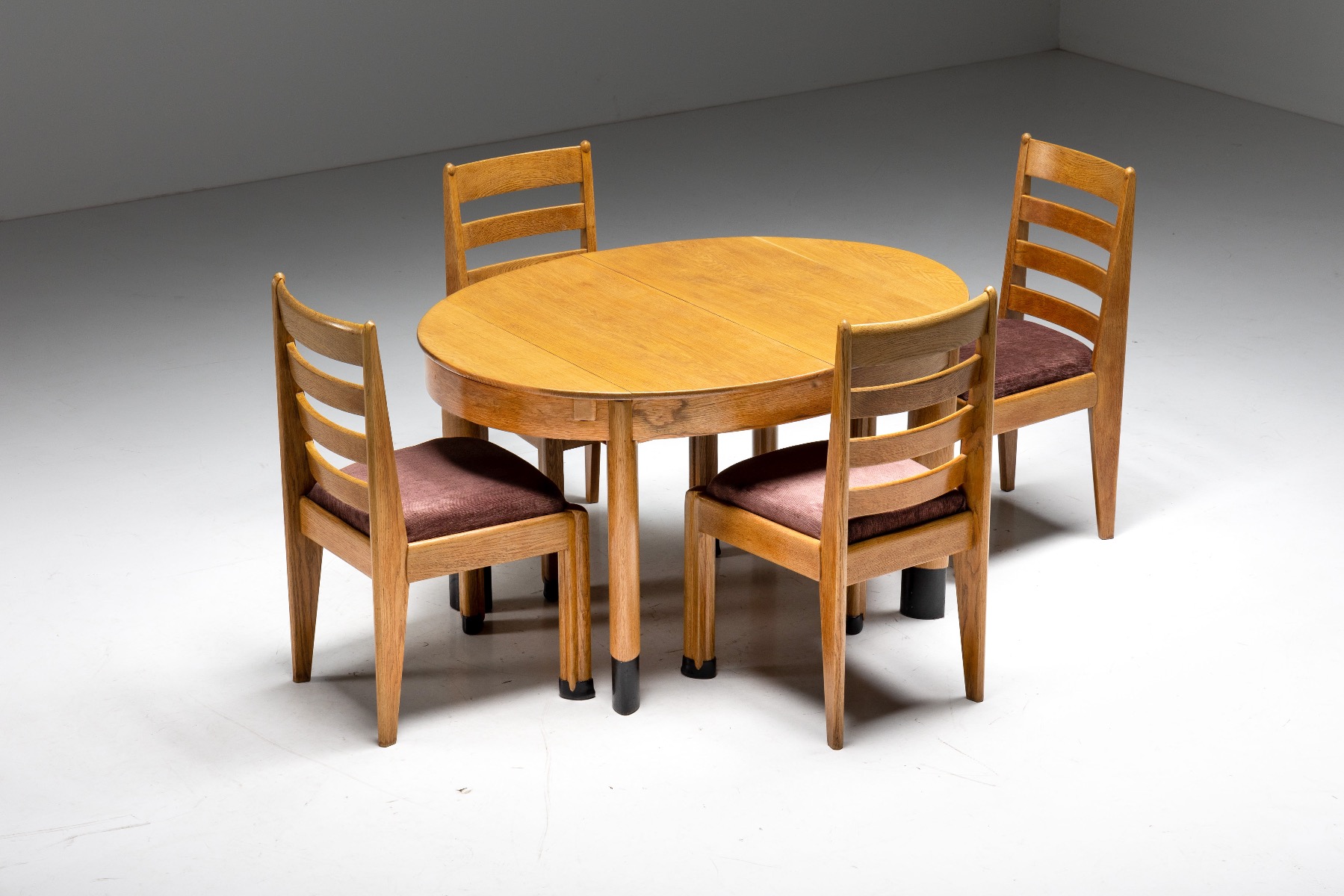 Iconic rationalist oval dining table in oak from the 1920s