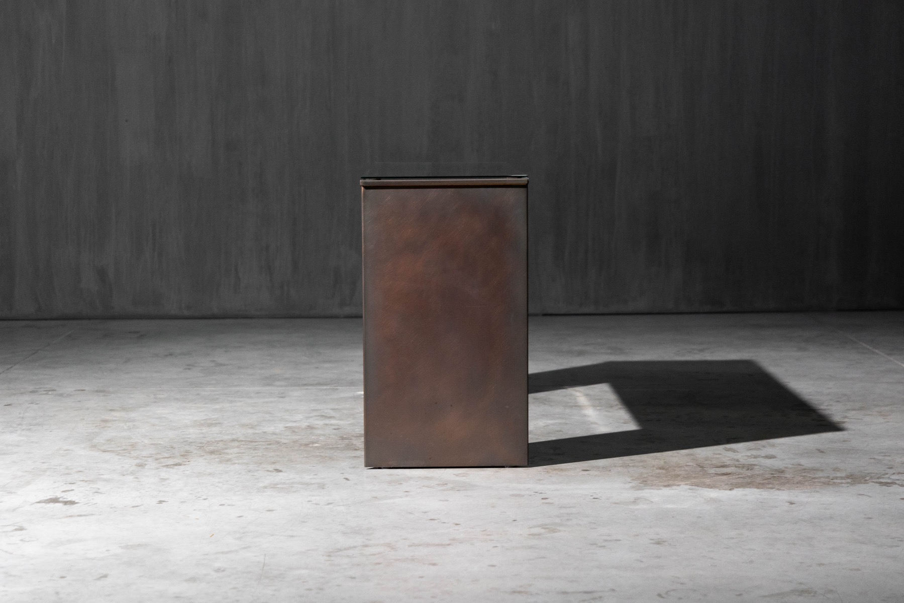 High end patinated bronze console table with sculptural form