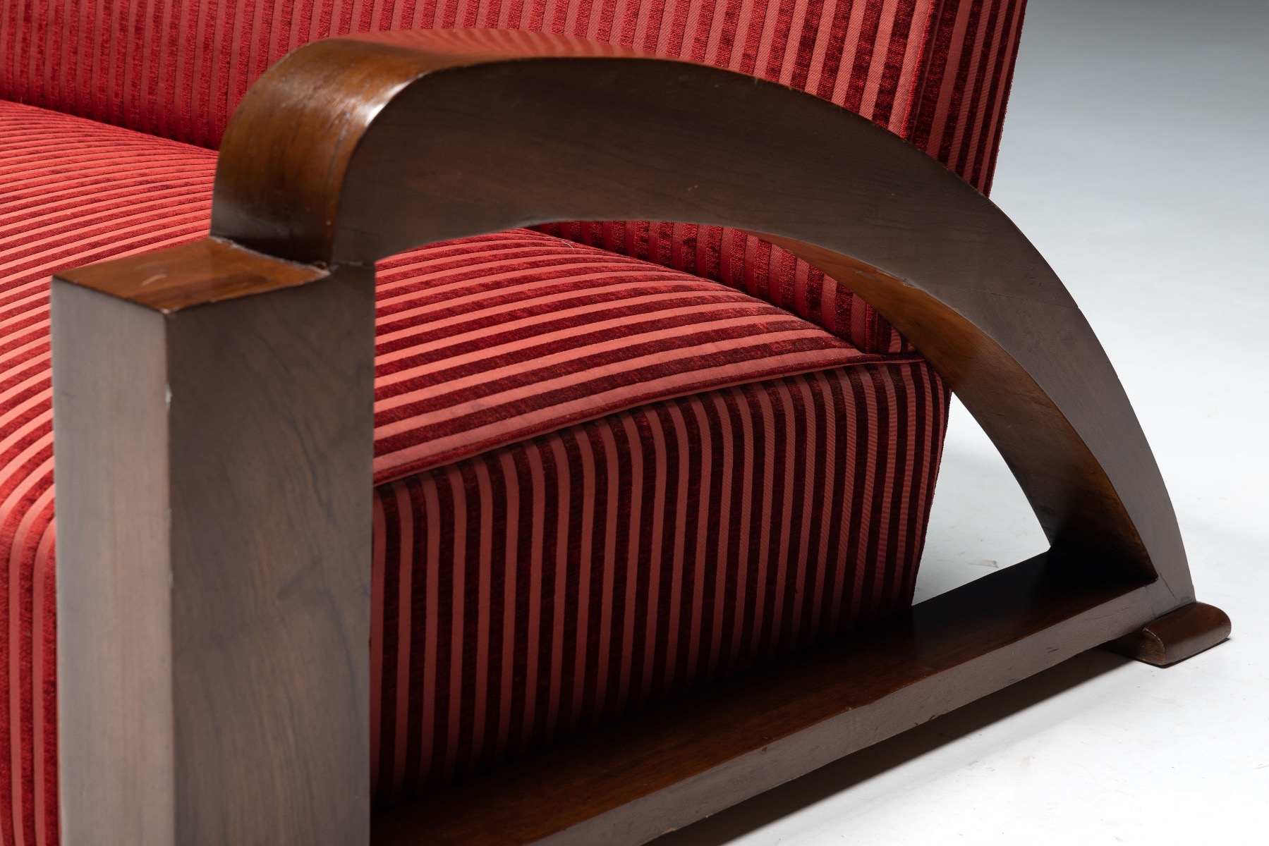 Luxury red velvet sofa in French art deco style