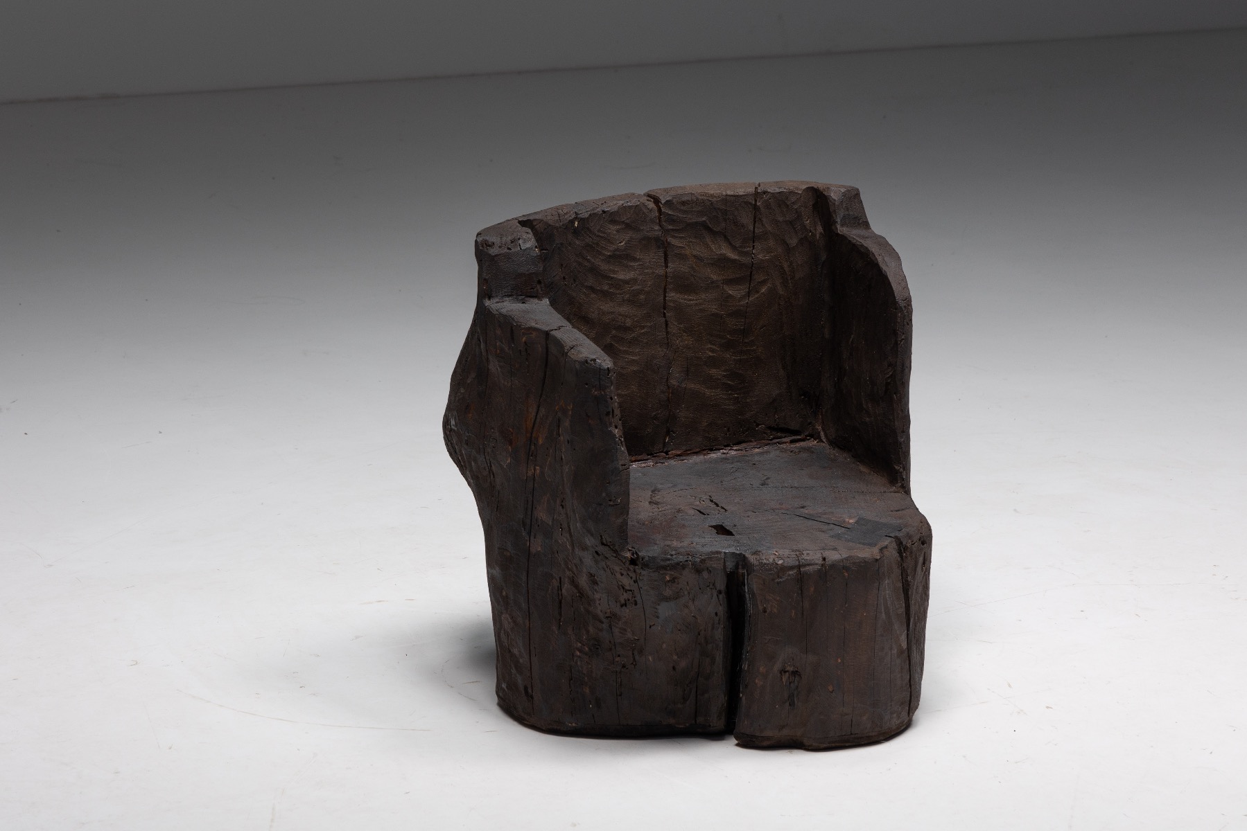 Minimalist brutalist armchairs in monoxylite style