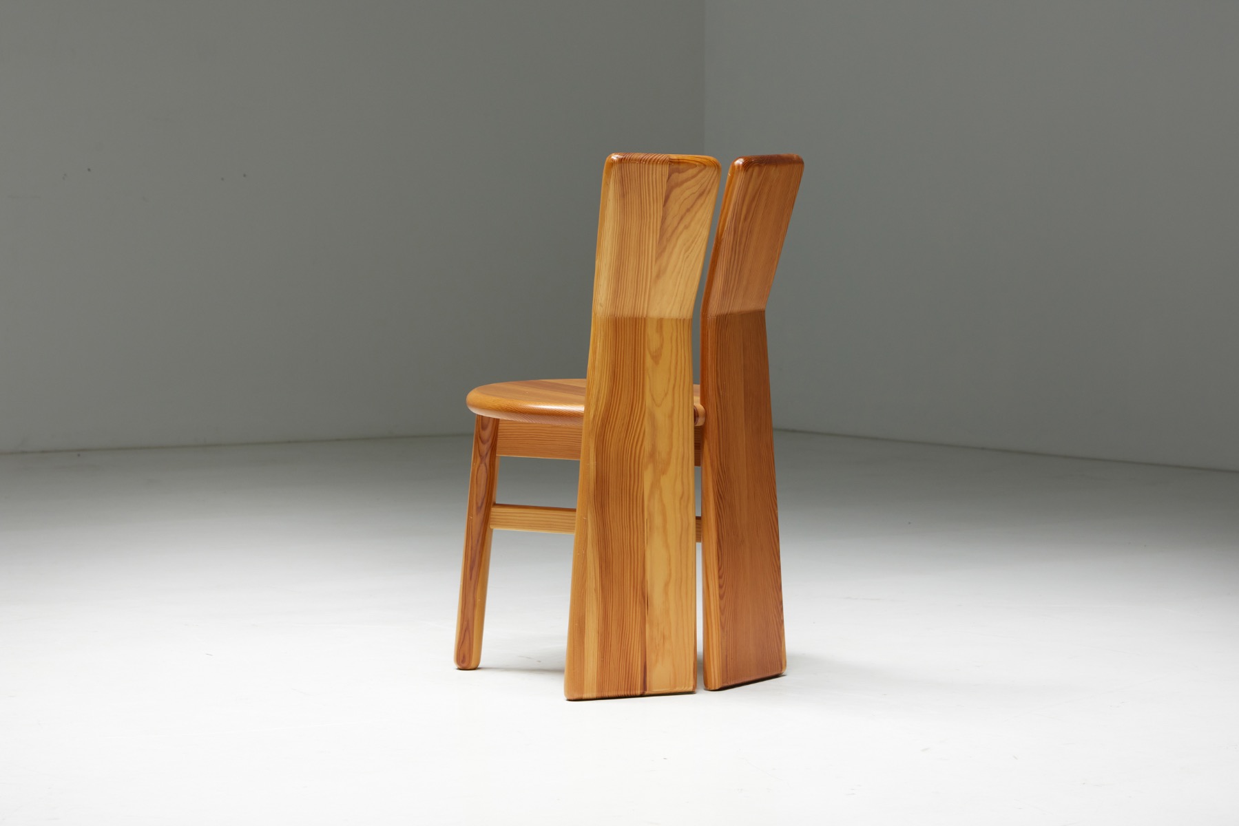 Minimalist brutalist dining chairs in pine wood