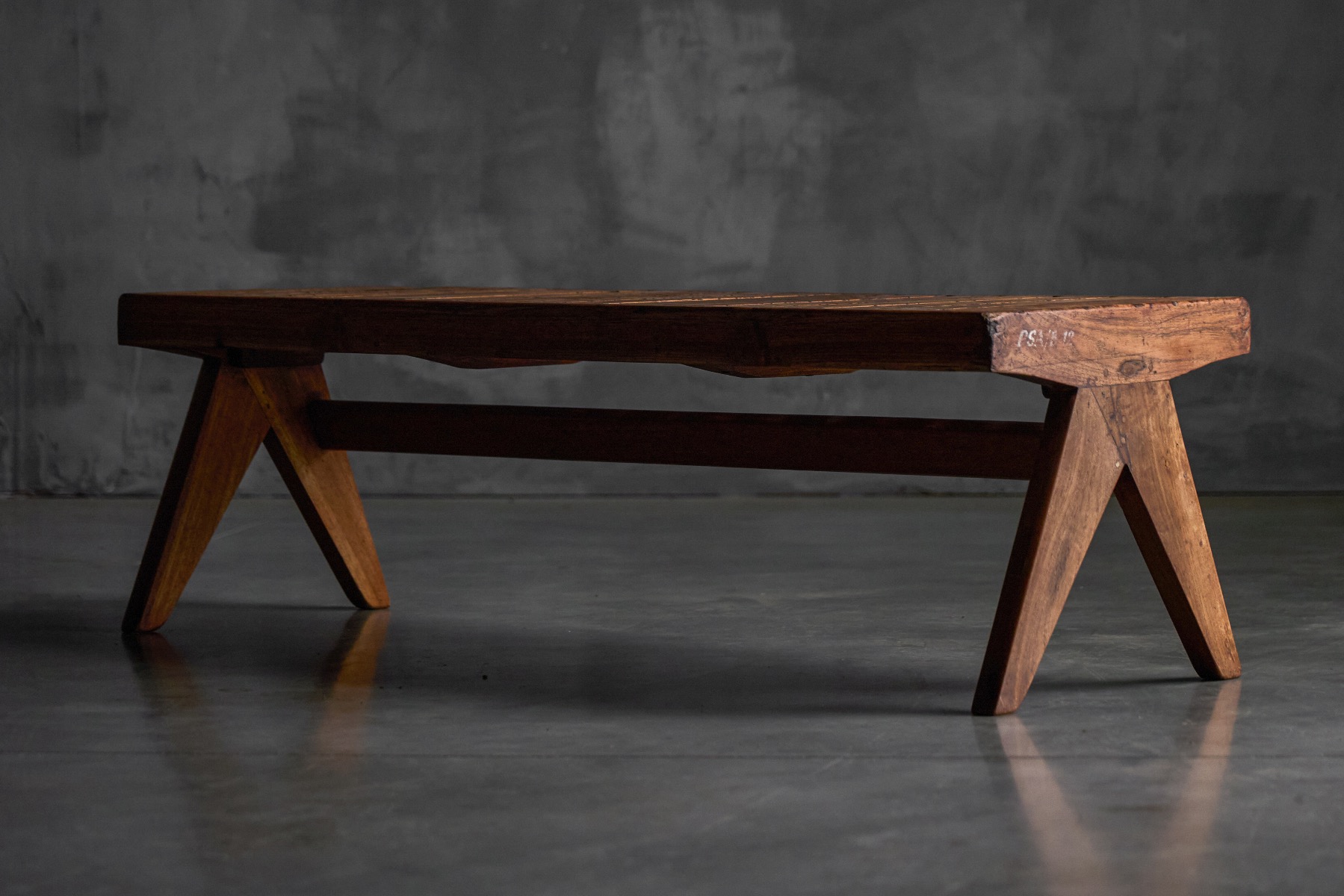Minimalist solid teak bench designed by Pierre Jeanneret