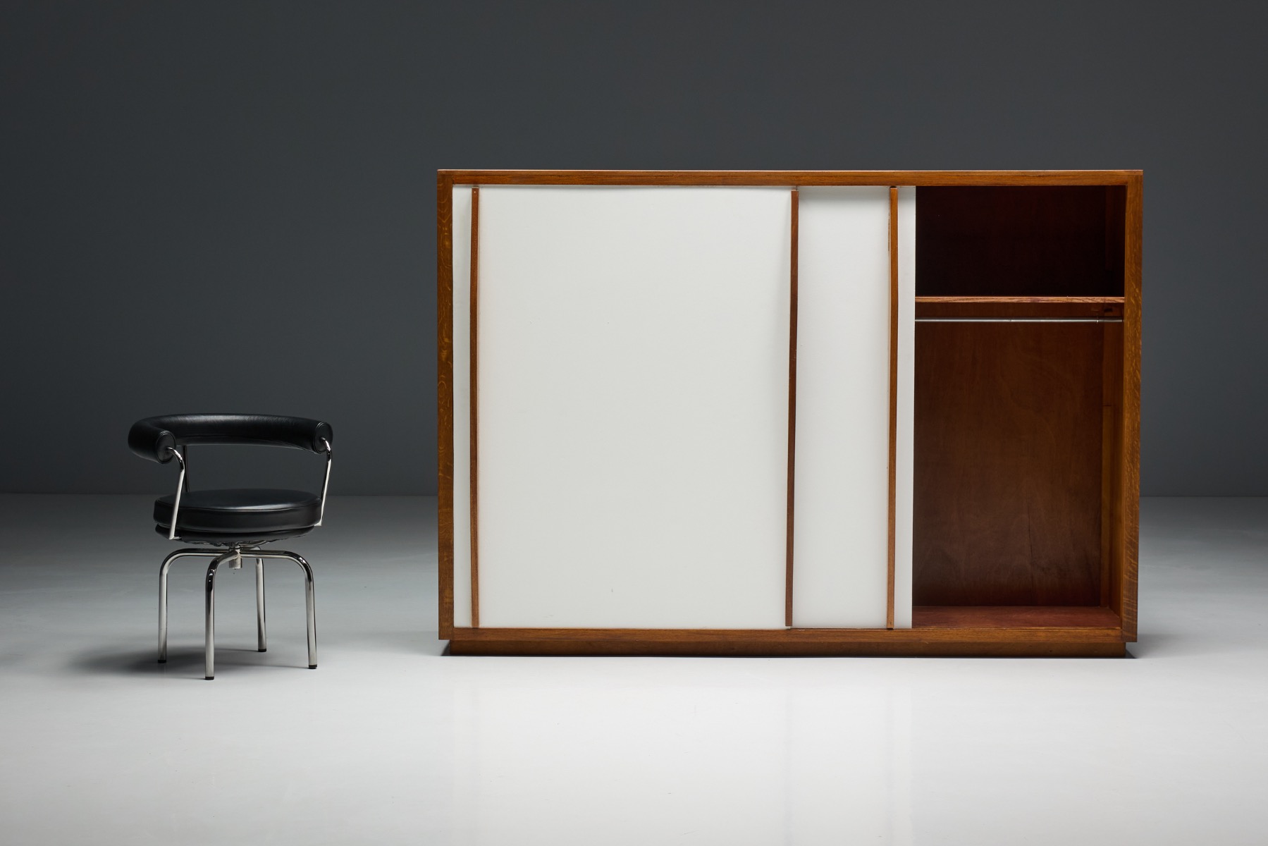 French modernist storage cupboard with integrated sliding doors from the 1950s  