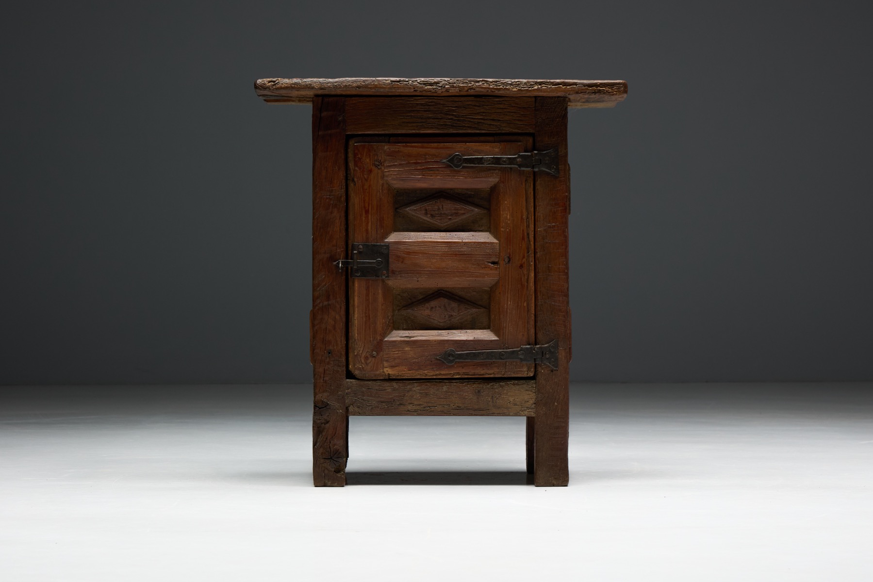 Rustic folk art style oak cabinet from the 19th century