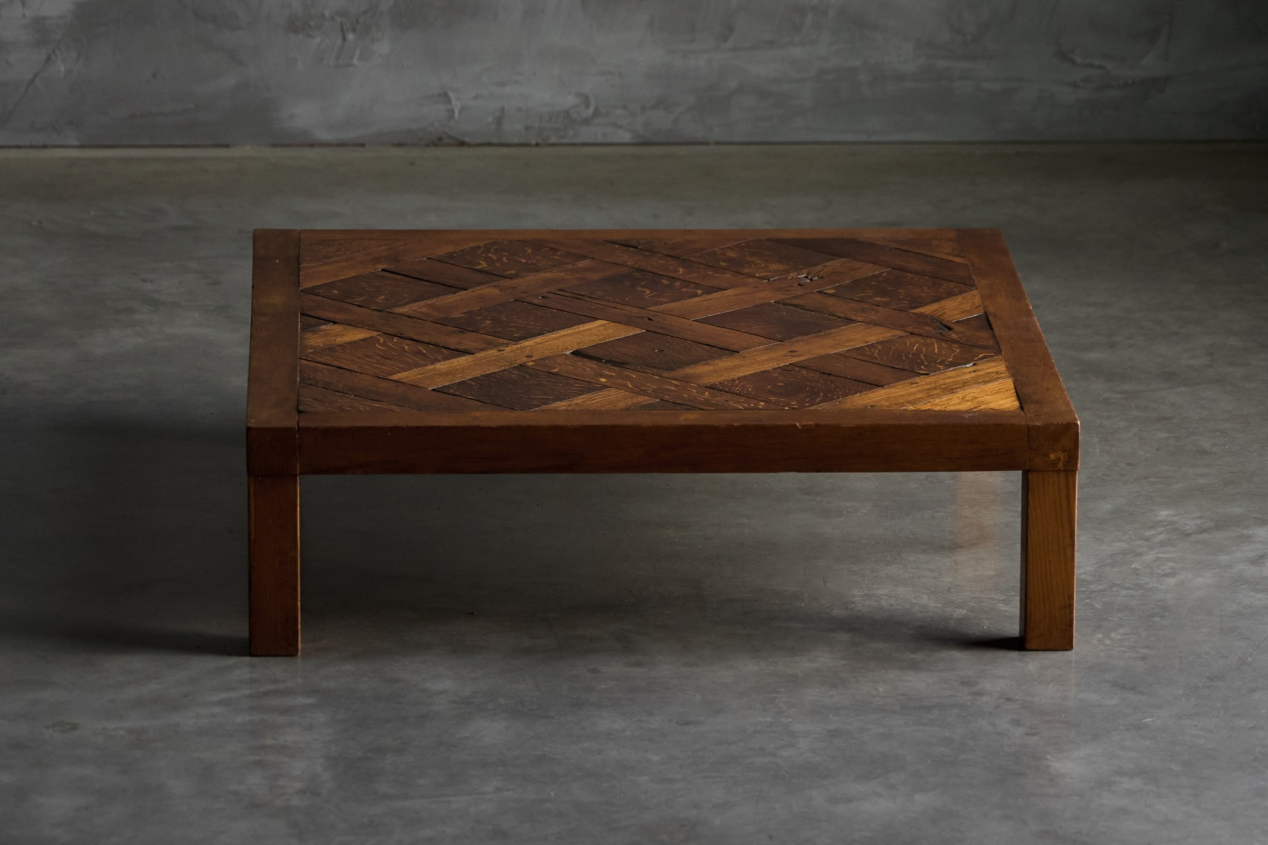Solid form parquet coffee table in brutalist style