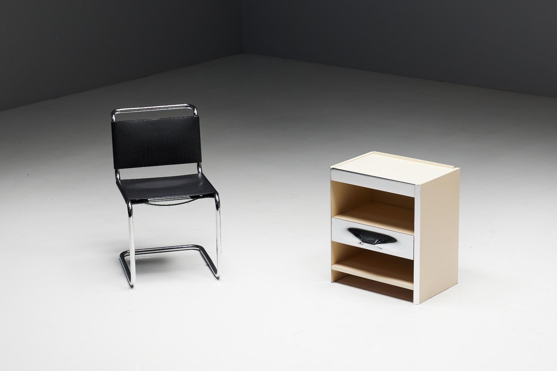 Timeless bedside table by Raymond Loewy design