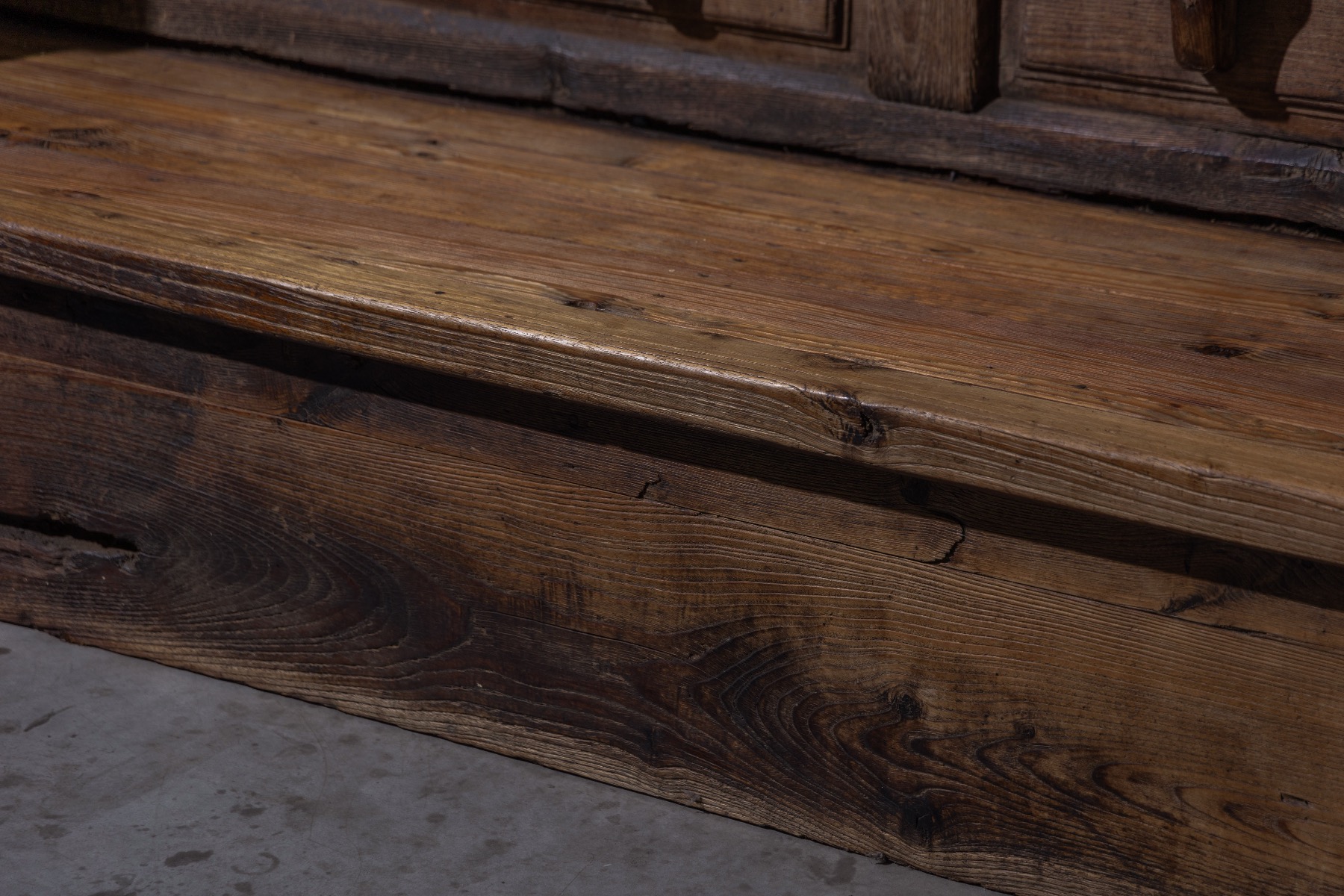 Mountain monastery bench with integrated table feature