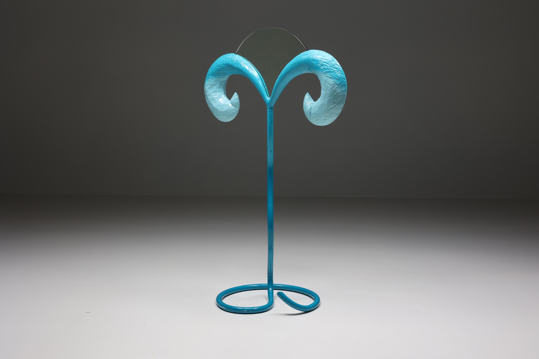 Bold sculptural mirror in postmodern 1970s style