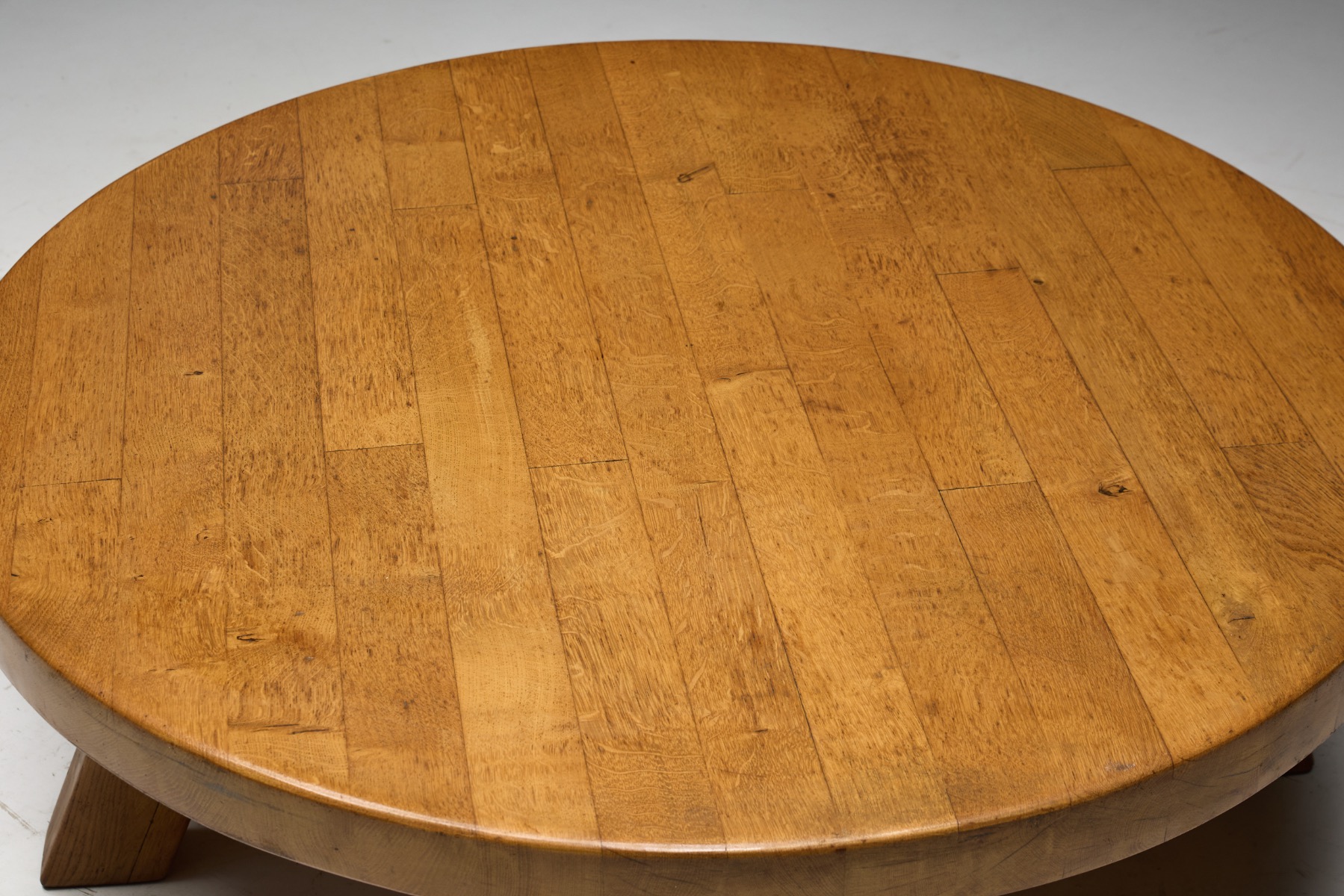 Collectible brutalist round coffee table in solid wood