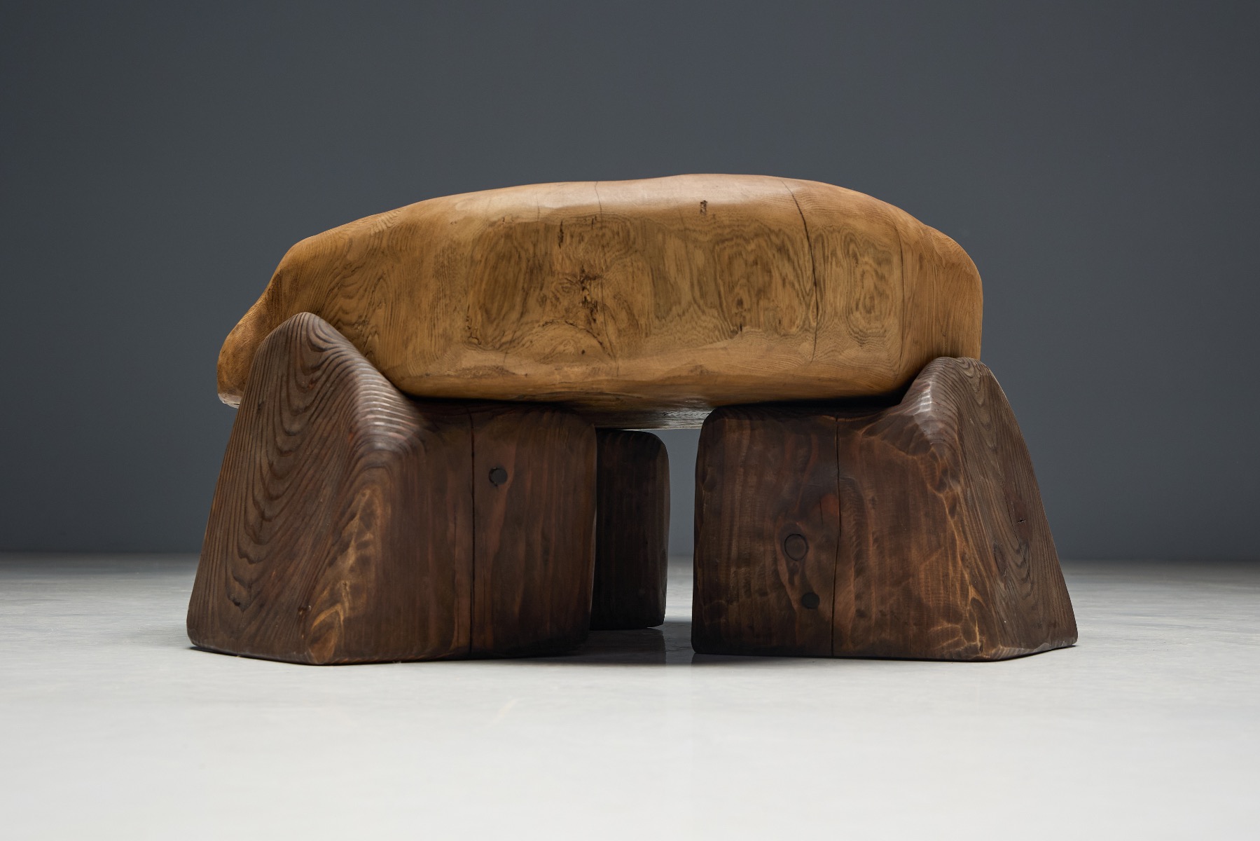 Contemporary sculpted coffee table with strong presence