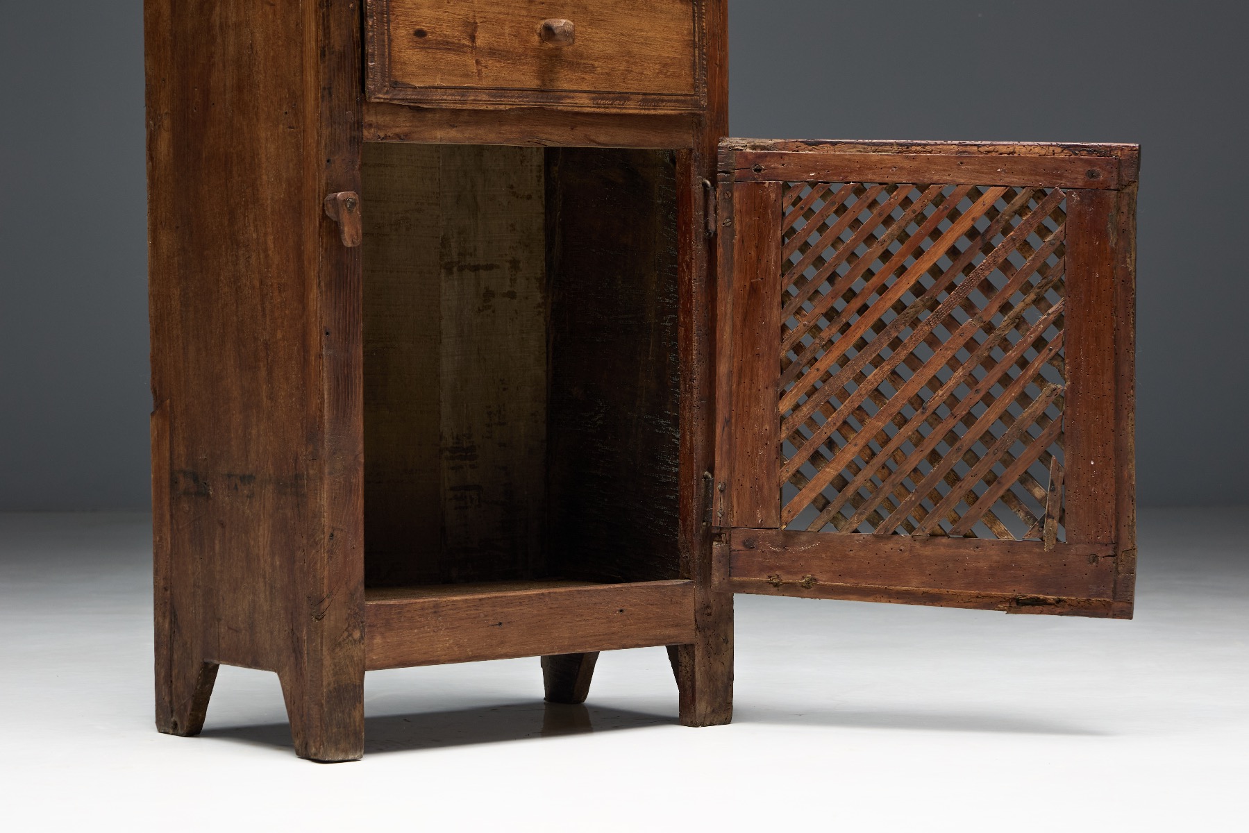 Heritage folk art cabinet with handcrafted elements