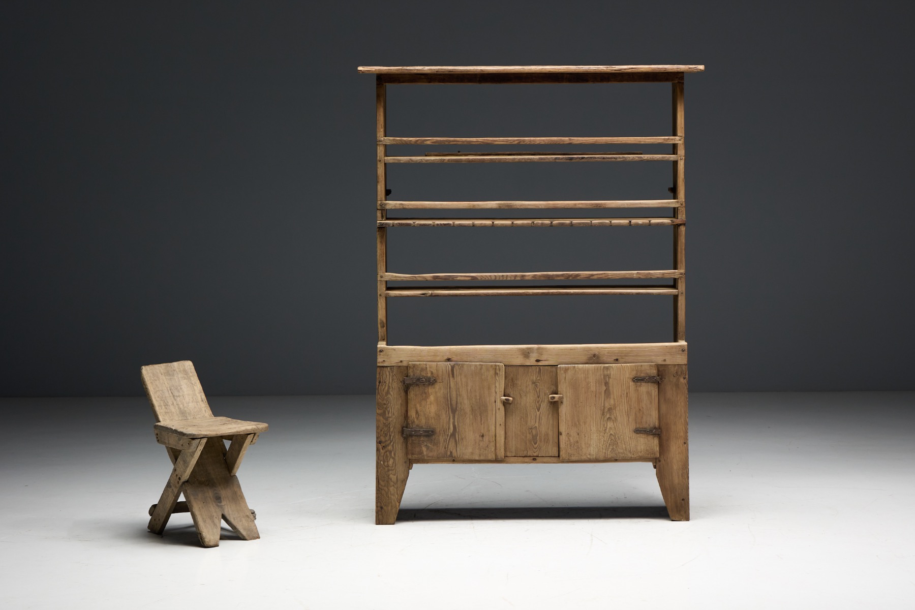 Historic primitive wooden cabinet with natural patina
