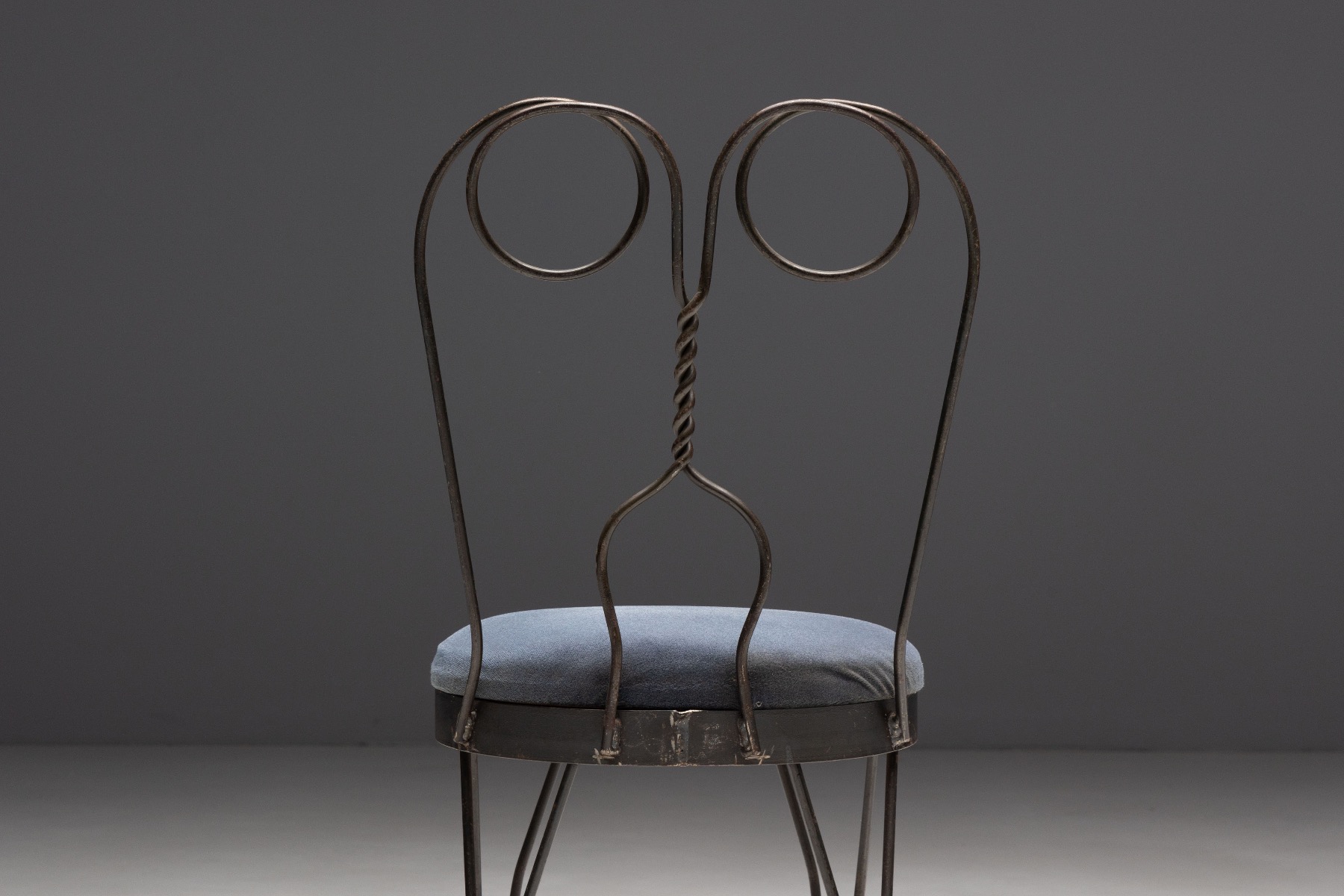 Museum level butterfly dining chair crafted in wrought iron