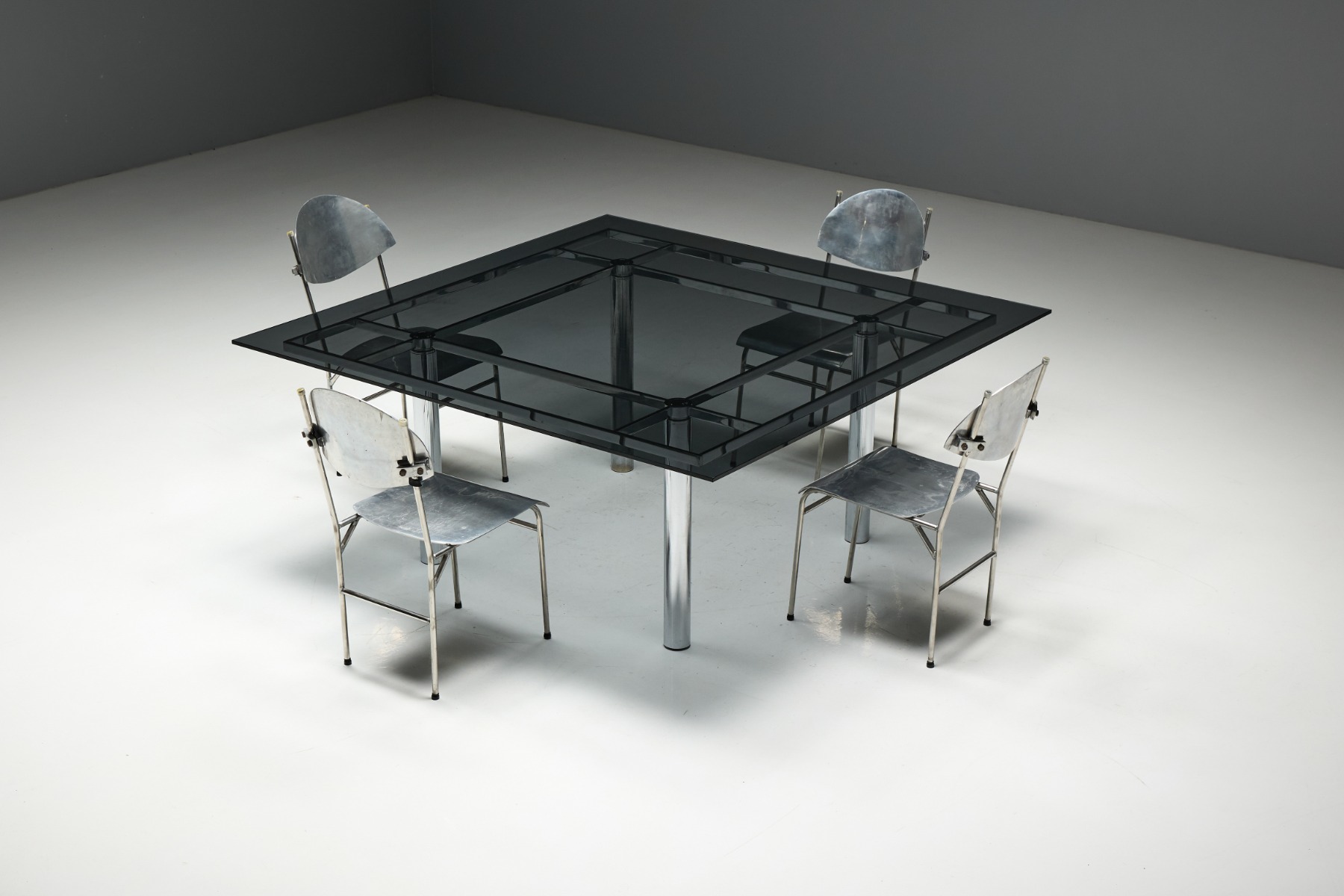 Timeless chrome dining table by Tobia Scarpa design