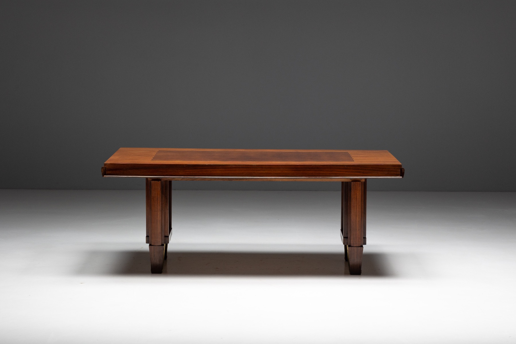 Geometric walnut parquetry top dining table