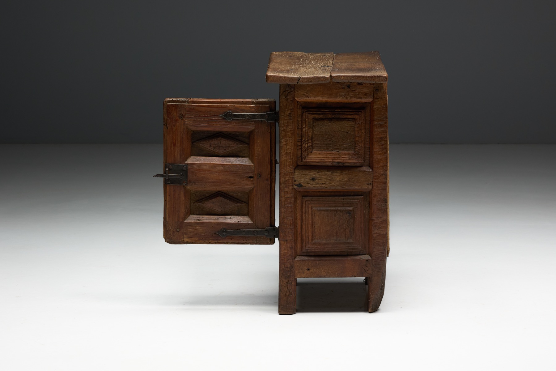 19th century oak cabinet with paneled door and simple cornice
