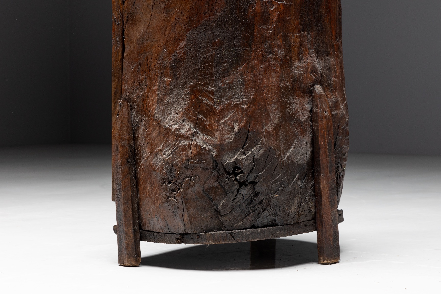 Aged monoxylite cabinet in primitive design