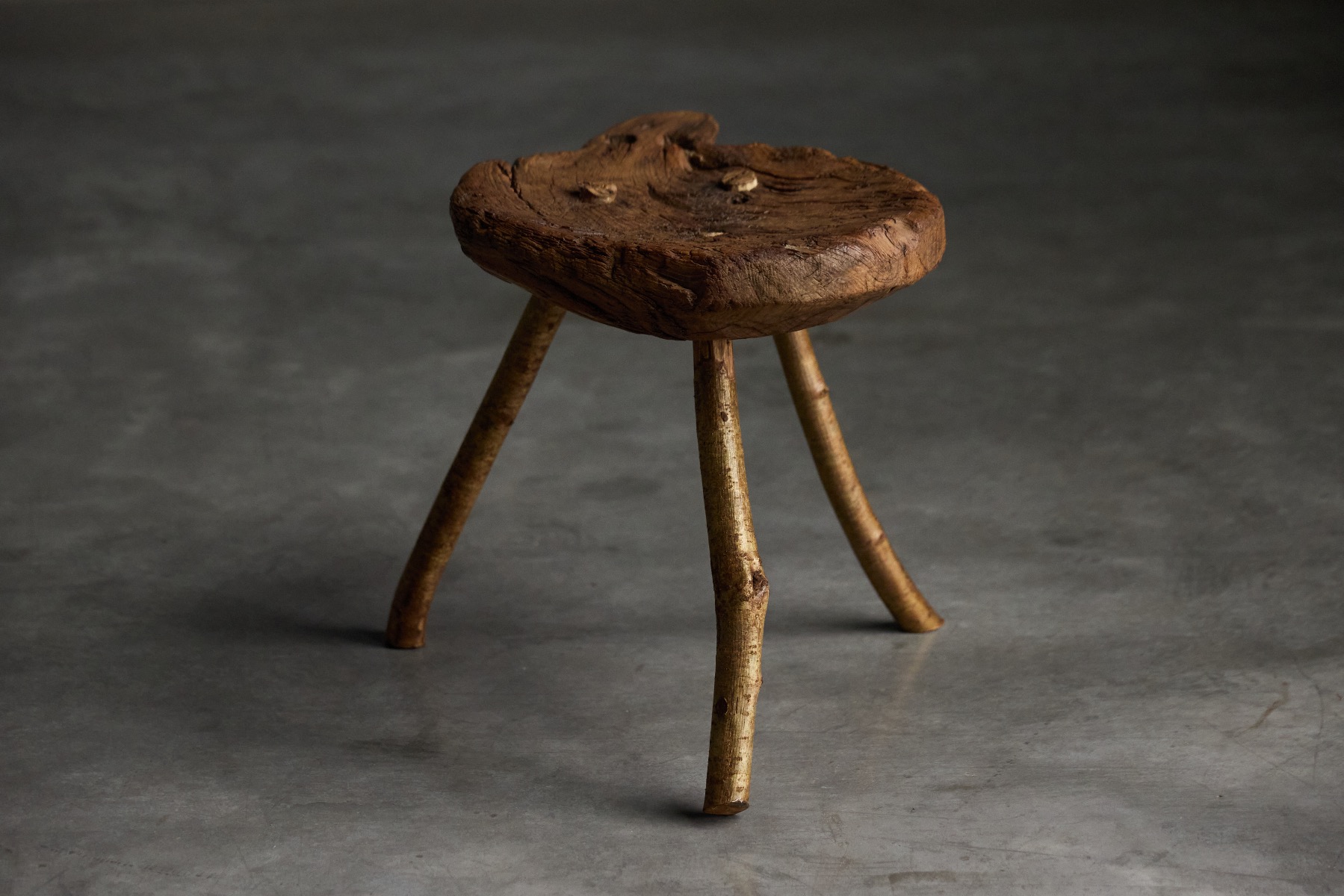 Timeworn solid wood stools with rustic appeal