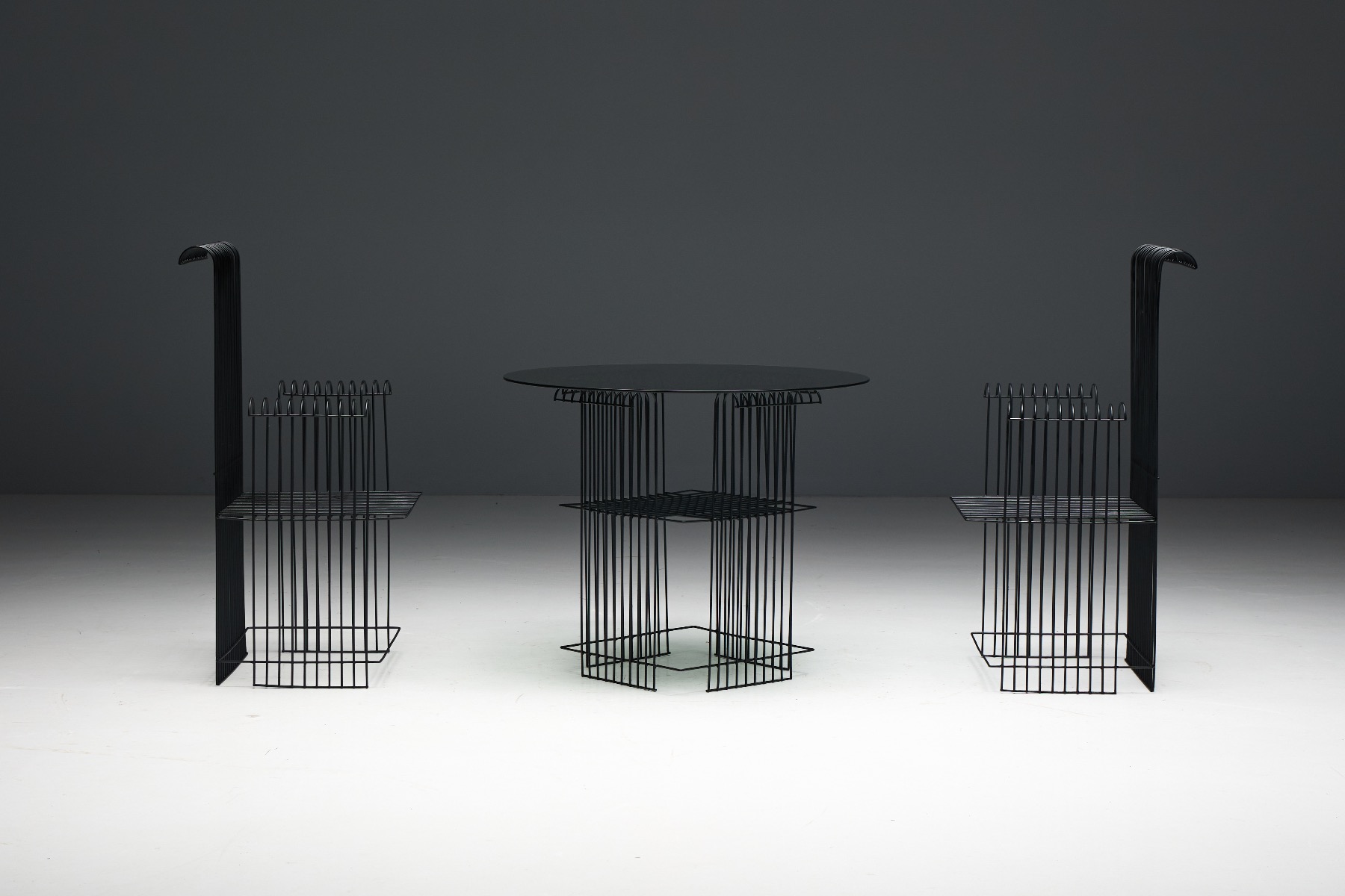 Open frame wire garden chairs and table