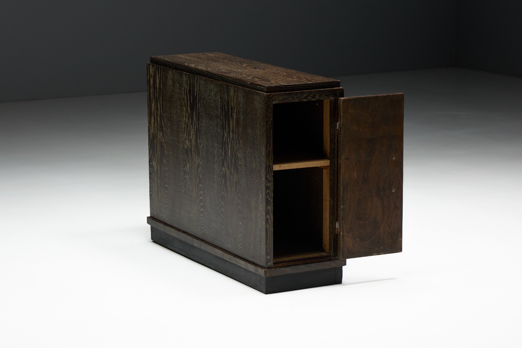 Geometric Art Deco oak cabinet reflecting 1940s design