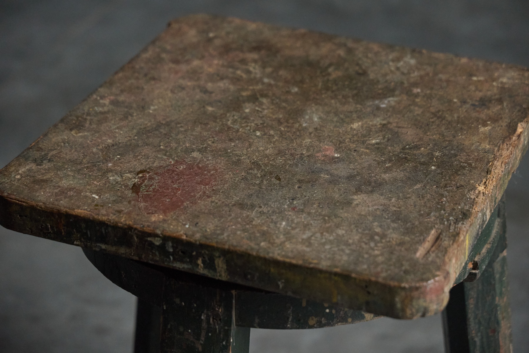 Aged industrial primitive stool from the 1800s