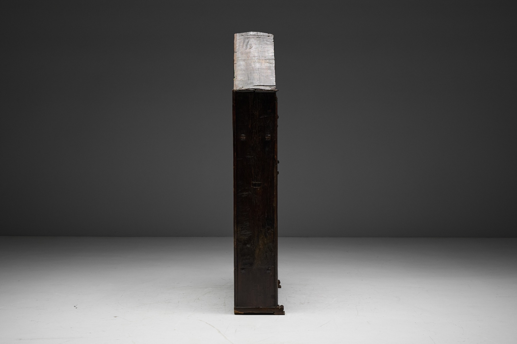 Aged wood vernacular cupboard with honest utilitarian form