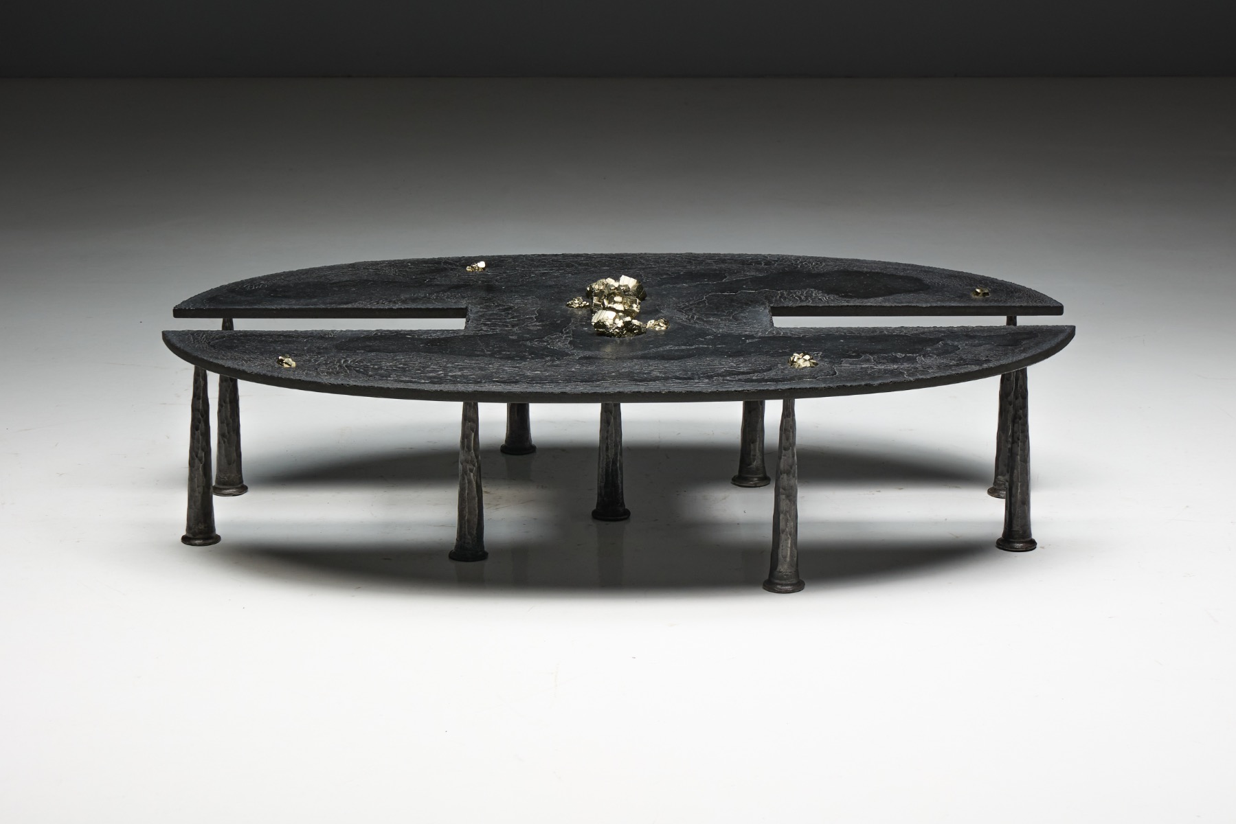 2019 brutalist coffee table in iron with mineral inclusions
