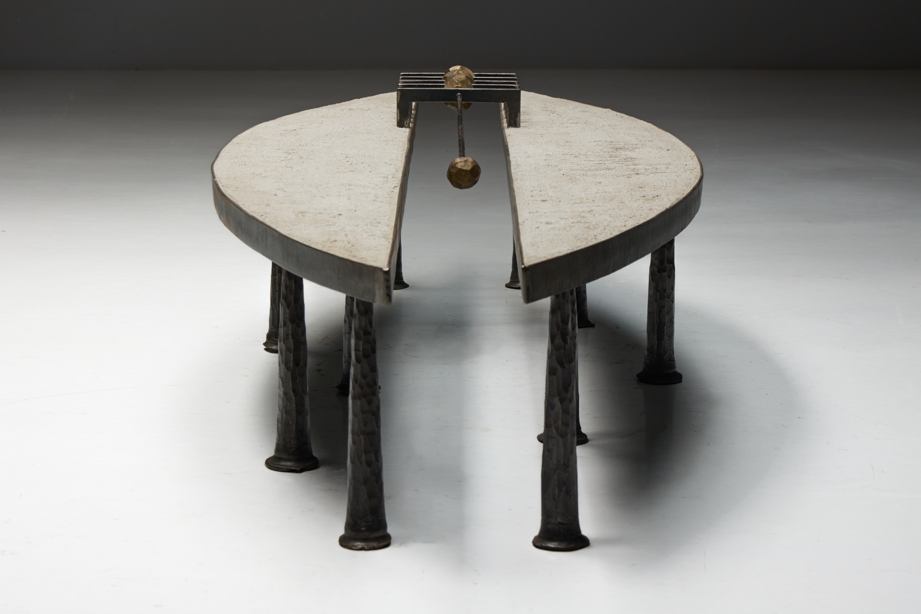 Contemporary steel and stone coffee table in brutalist language by Thomas Serruys