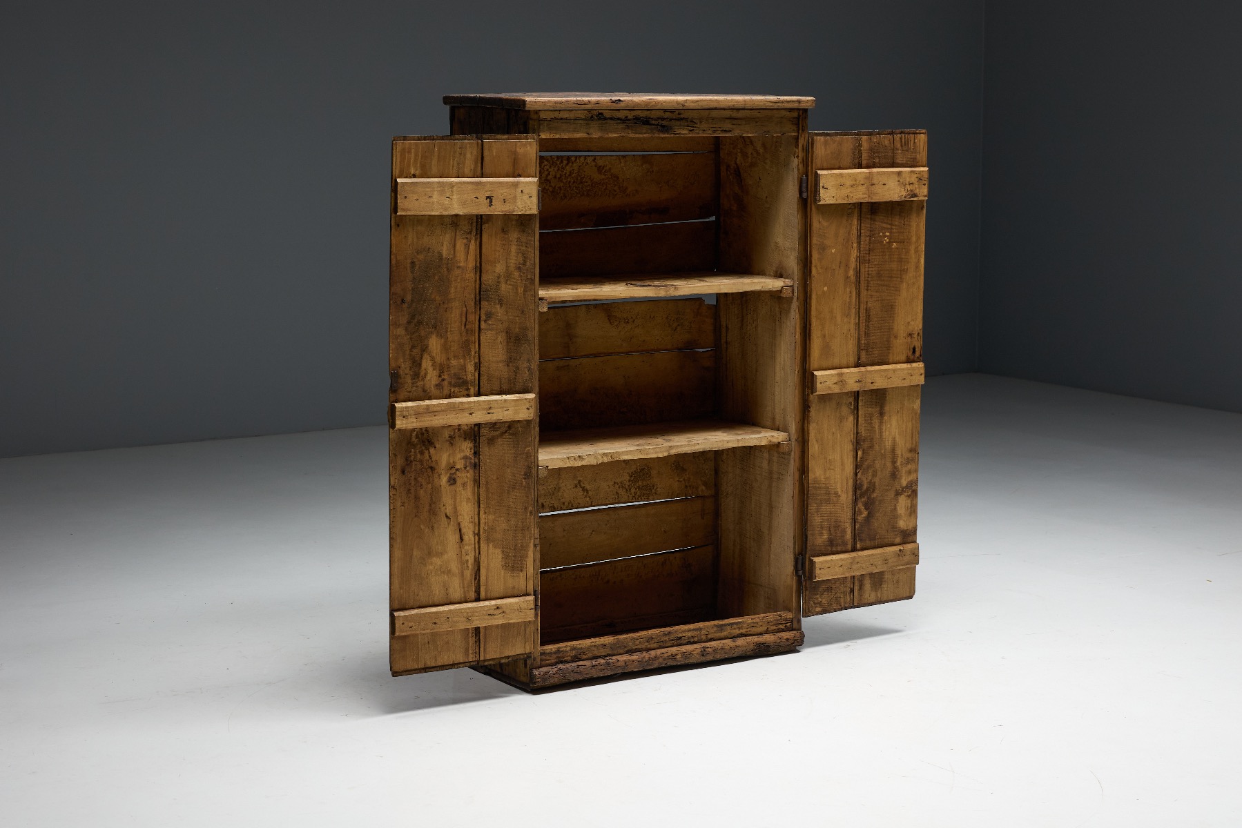Historic rural travail populaire cabinet with timeworn surface