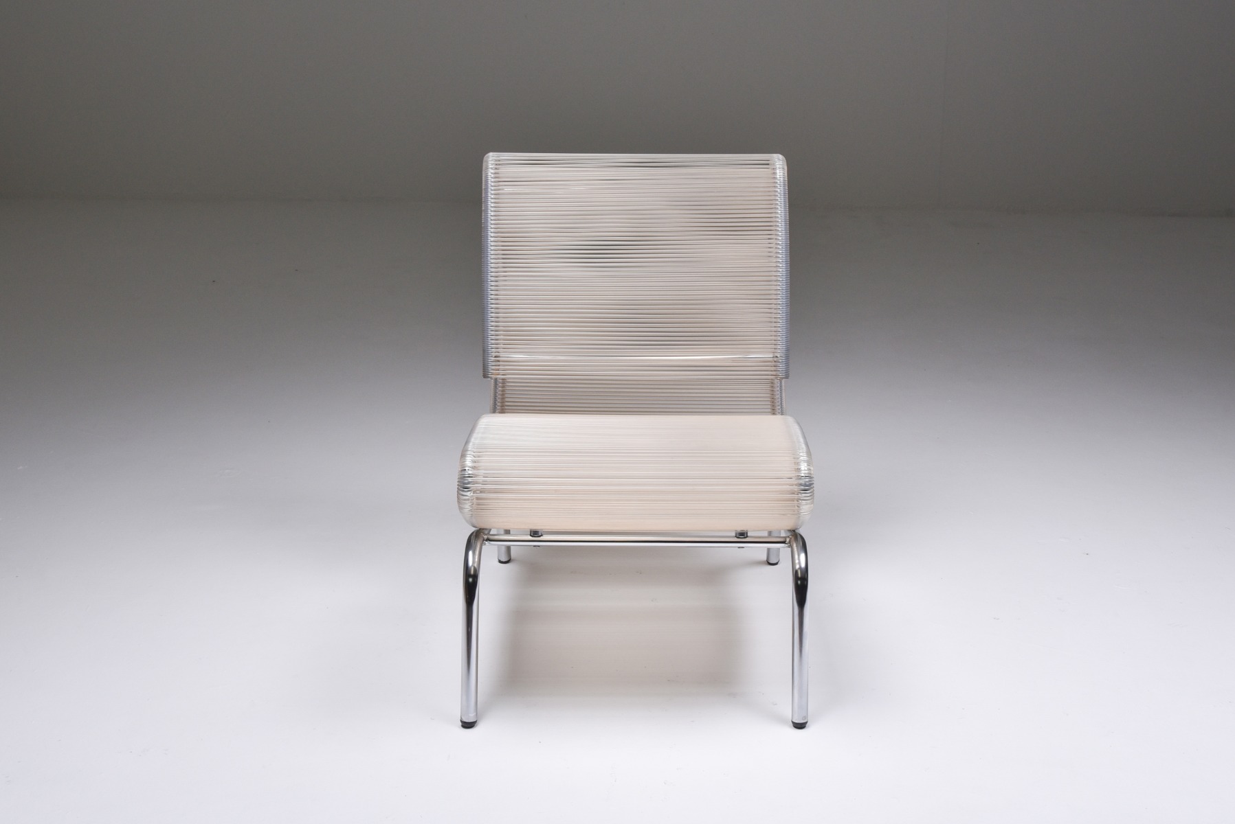 Minimalist chrome wire chairs from the 1960s style