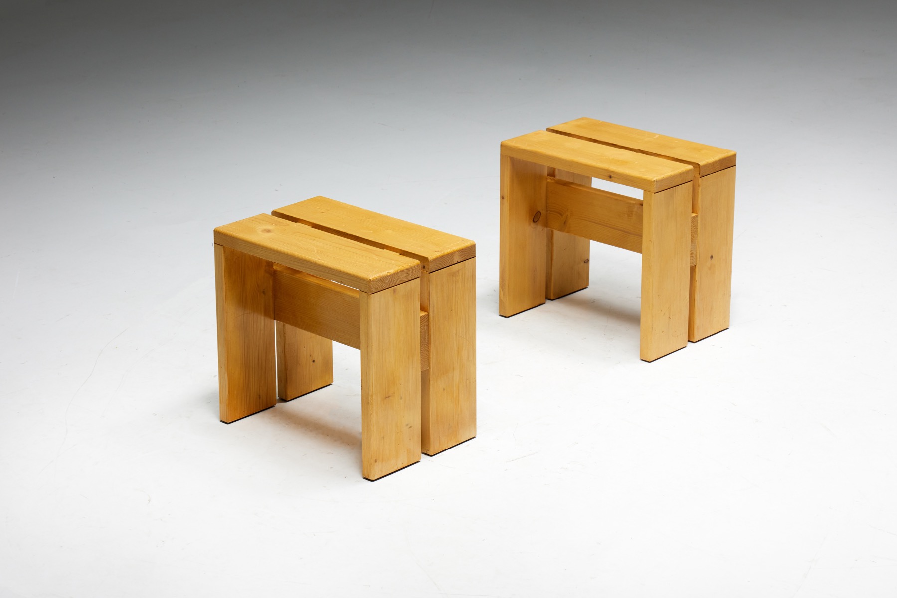 Minimalist Les Arcs stools in Charlotte Perriand style