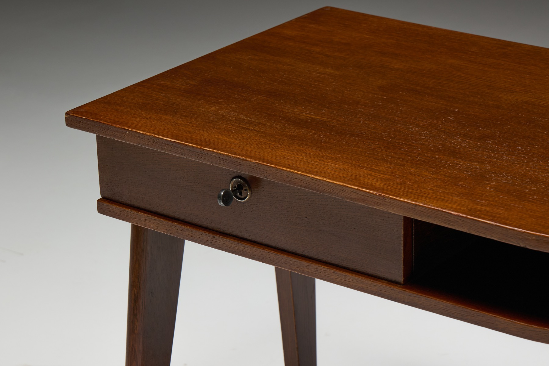 Oak writing desk with tripod support designed by Jacques Adnet