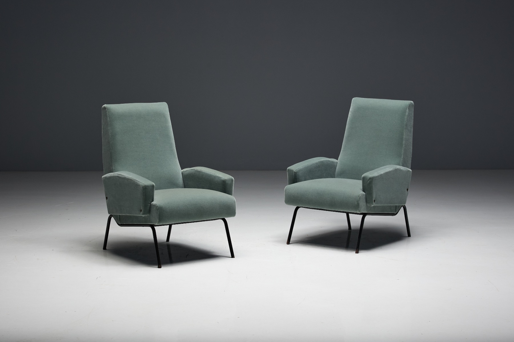 Retro mid century lounge chairs with refined lines