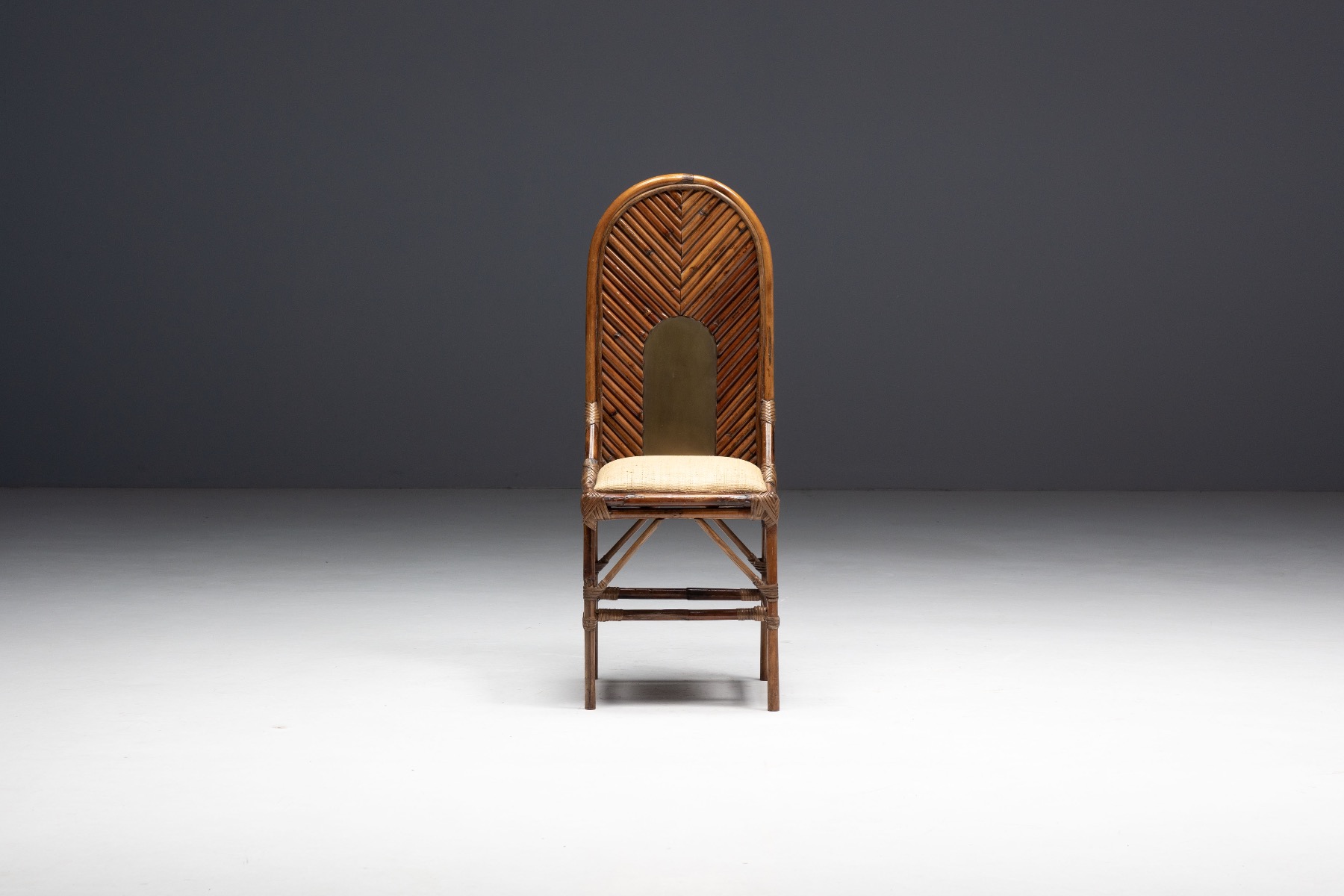 Refined bamboo and brass chair with seventies character