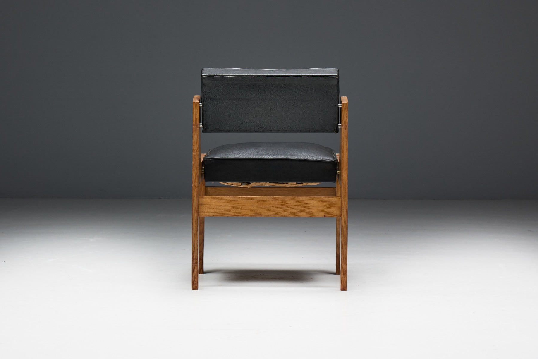 Refined oak and vinyl chairs in Wim den Boon style