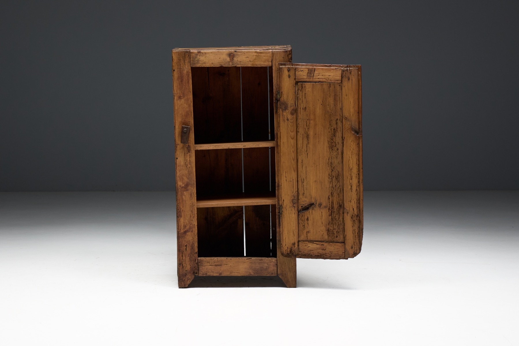 Simple rural Alpine cupboard in vernacular style