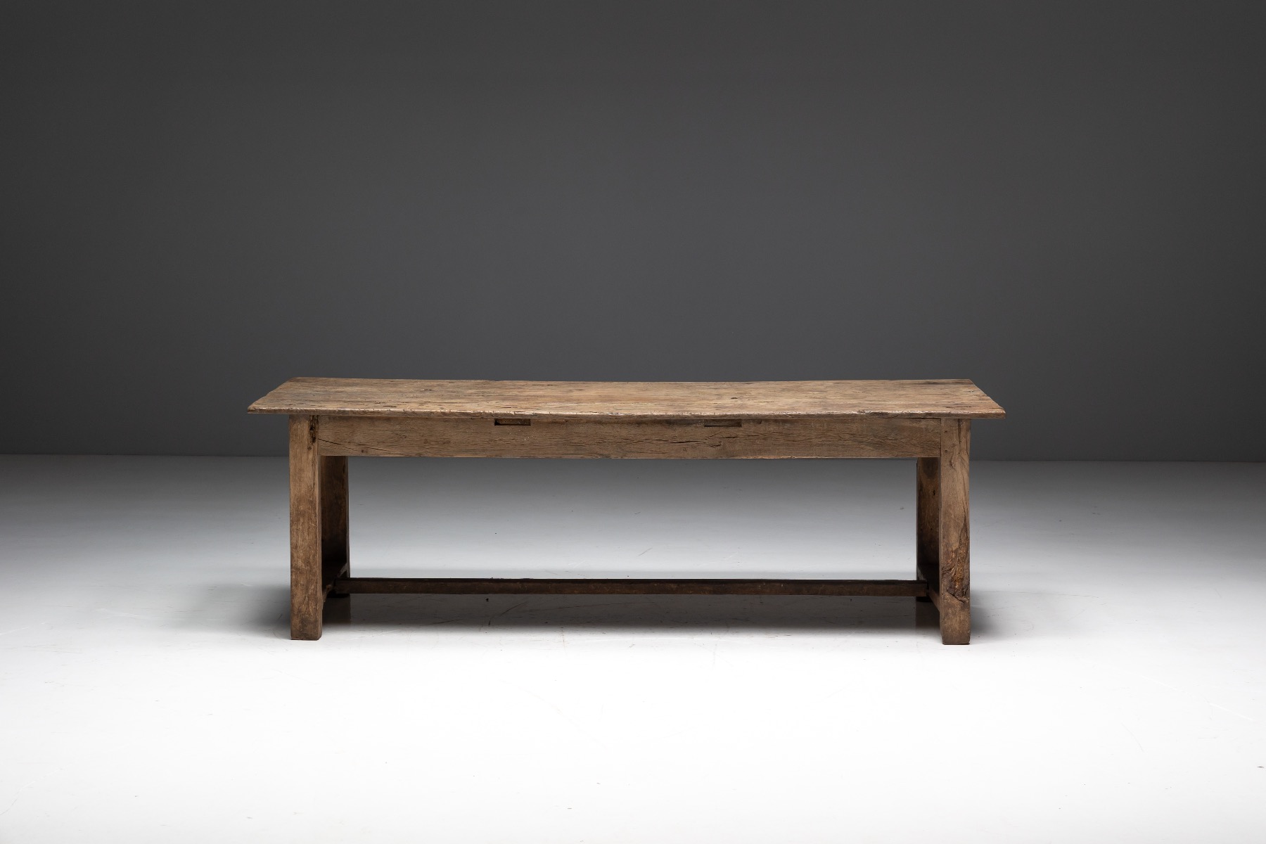 Simple rustic dining table used in a farmhouse setting