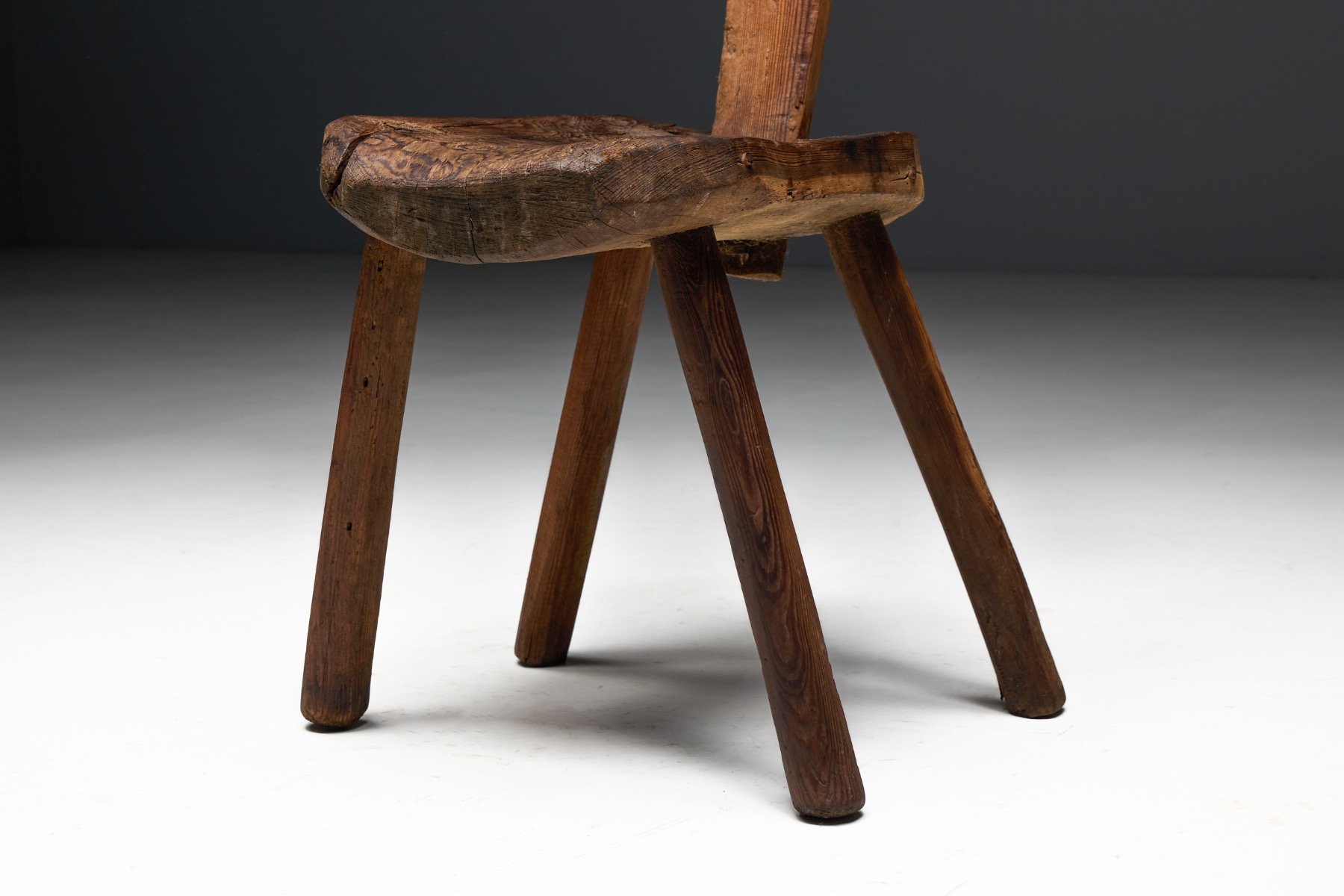 Solid wood Alpine folk art chair with honest materiality