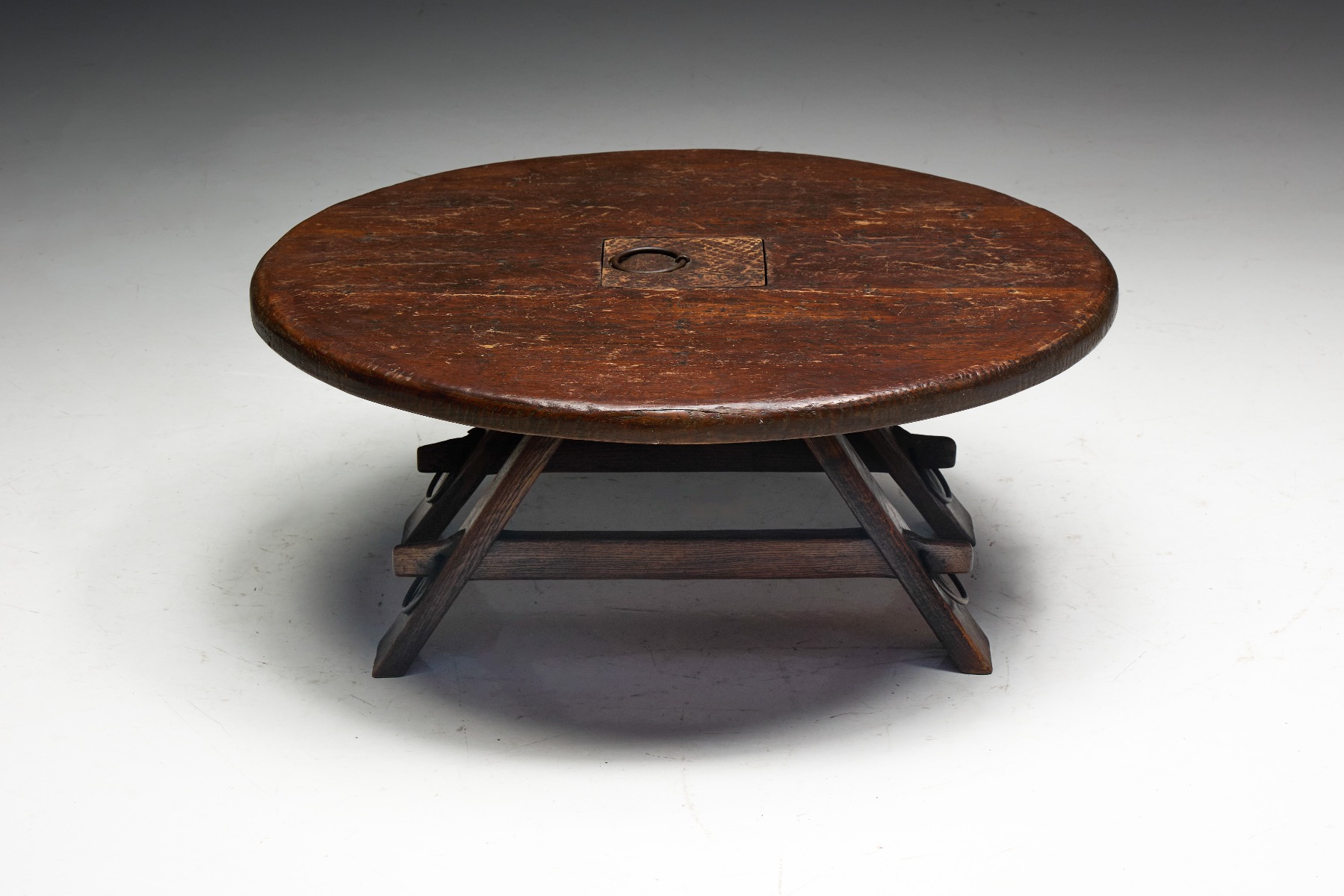 Weathered wood coffee table with antique appeal