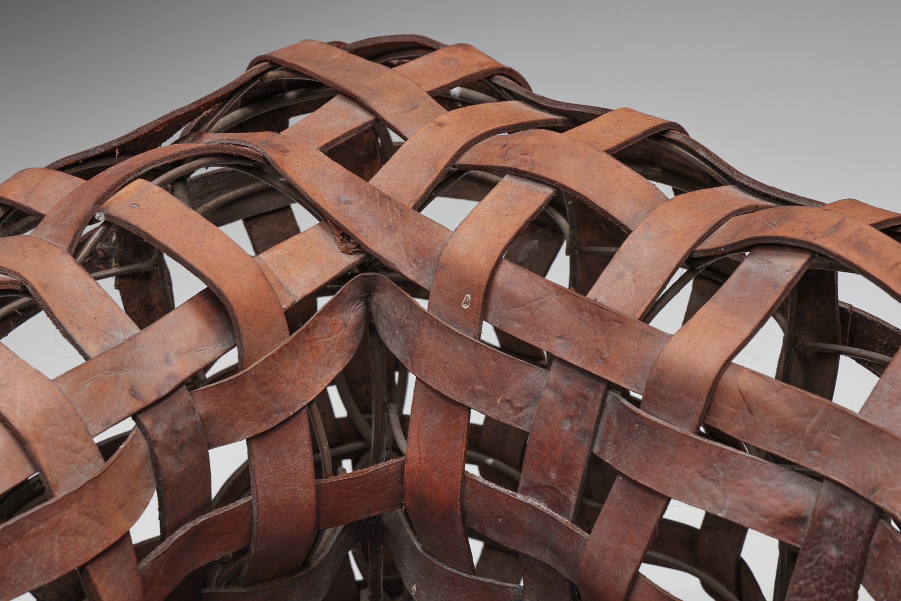 Unique sculptural leather sofa in woven UK design